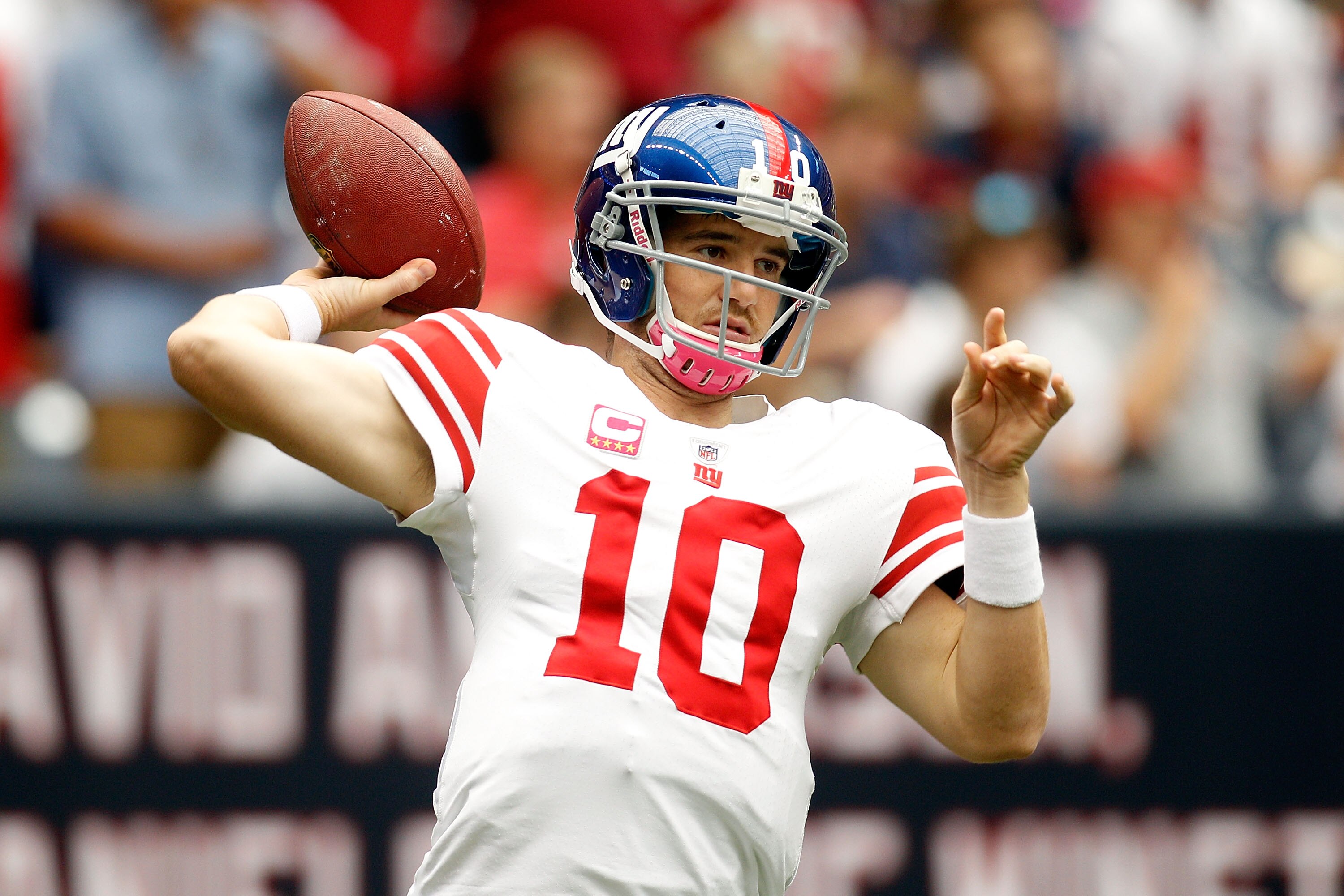 HOUSTON - OCTOBER 10:  Eli Manning #10 of the New York Giants warms up before playing the Houston Texans at Reliant Stadium on October 10, 2010 in Houston, Texas.  (Photo by Chris Graythen/Getty Images)