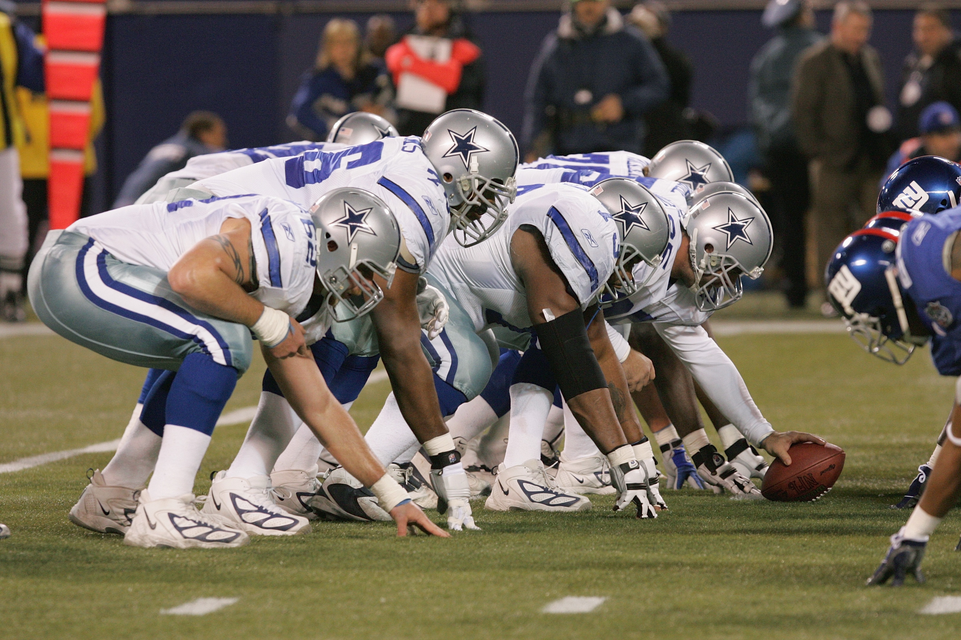 EAST RUTHERFORD, NJ - JANUARY 2:  The Dallas Cowboys offensive line readies for game action against the New York Giants during the game on January 2, 2005 at Giants Stadium in East Rutherford, New Jersey.   The Giants won 28-24.  (Photo by Jim McIsaac/Get