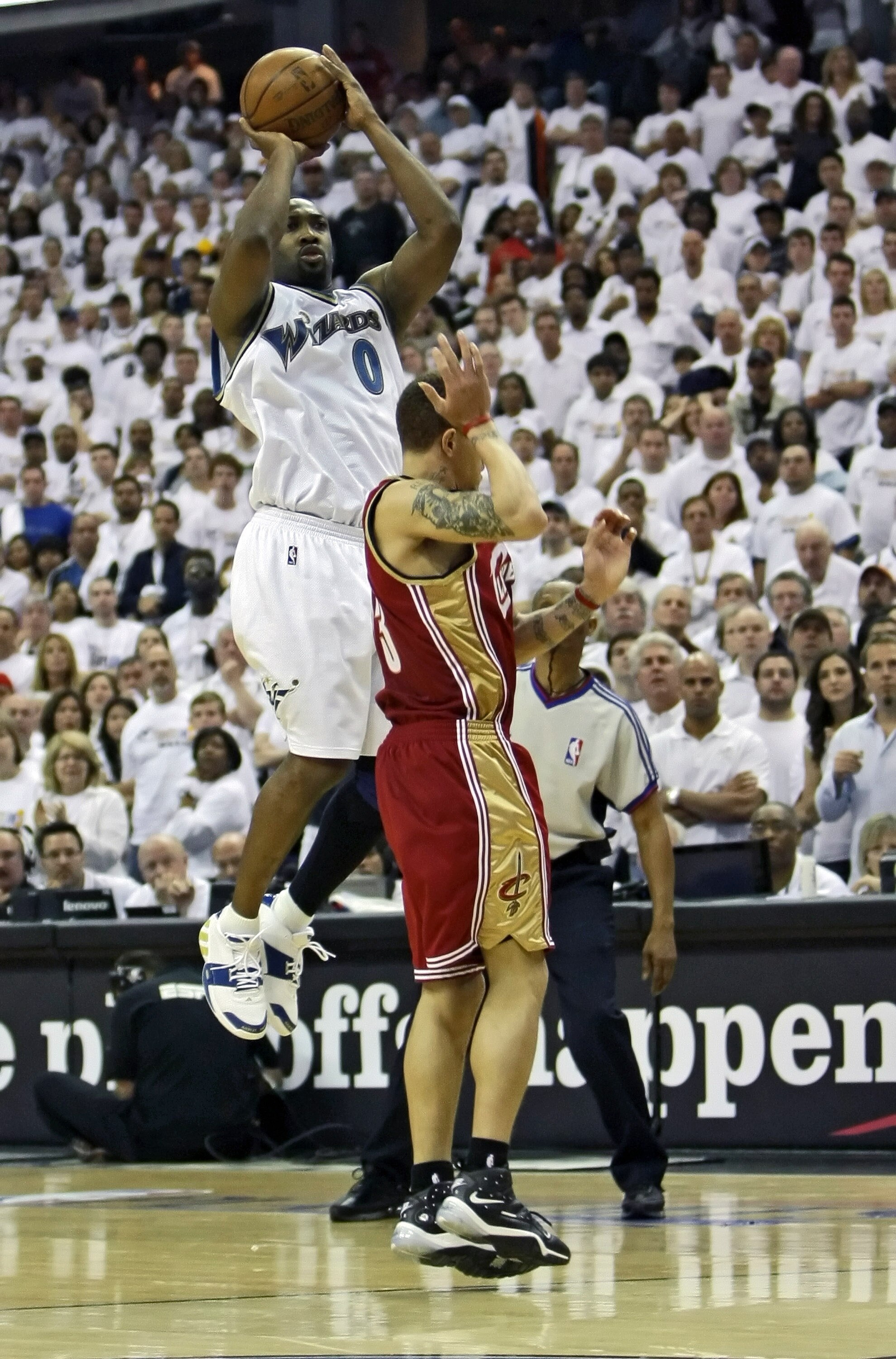 WASHINGTON - APRIL 27: Gilbert Arenas #0 of the Washington Wizards attempts a last second 3-point-shot over Delonte West #13 of the Cleveland Cavaliers in Game Four of the Eastern Conference Quarterfinals during the 2008 NBA Playoffs at the Verizon Center