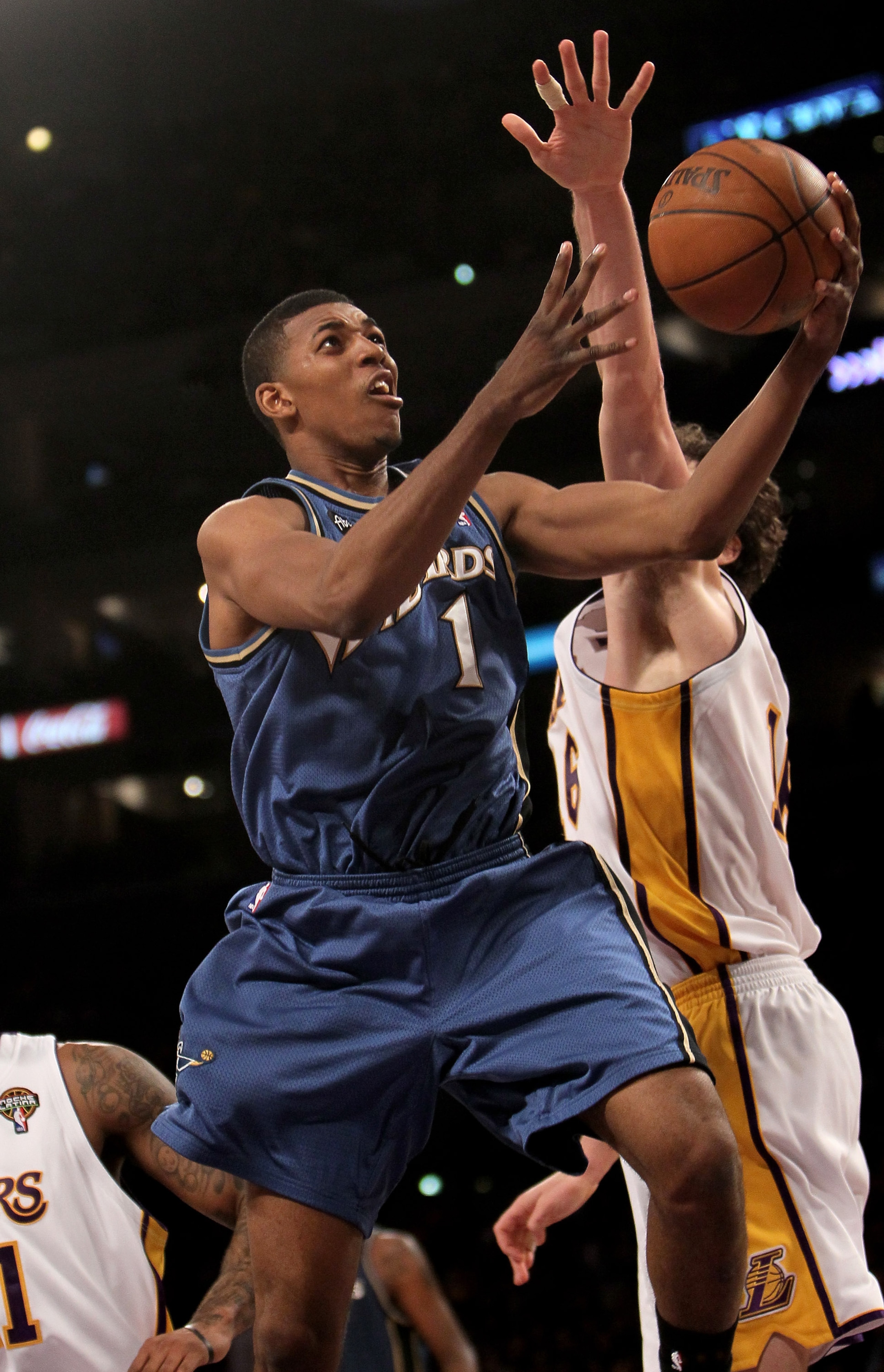 LOS ANGELES, CA - MARCH 21:  Nick Young #1 of the Washington Wizards goes up for a shot against the Los Angeles Lakers on March 21, 2010 at Staples Center in Los Angeles, California.  The Lakers won 99-92.  NOTE TO USER: User expressly acknowledges and ag