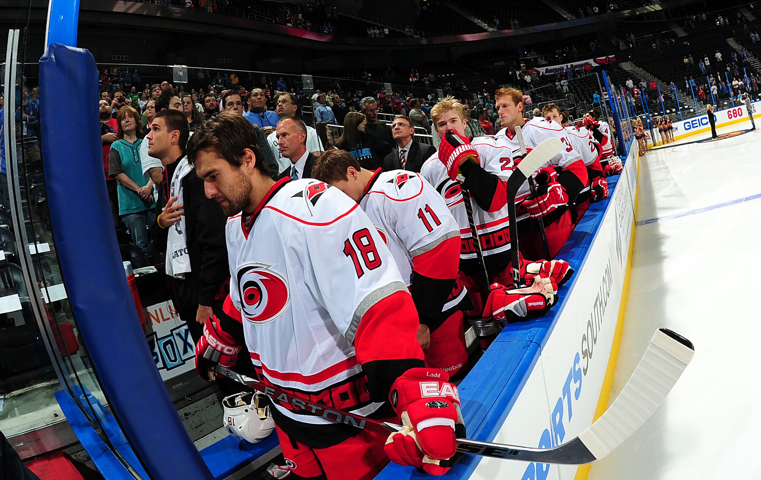 ATLANTA - SEPTEMBER 25: Members of the Carolina Hurricanes stand at attention before the game against the Atlanta Thrashers at Philips Arena on September 25, 2010 in Atlanta, Georgia. The Hurricanes won 1-0. (Photo by Scott Cunningham/Getty Images)