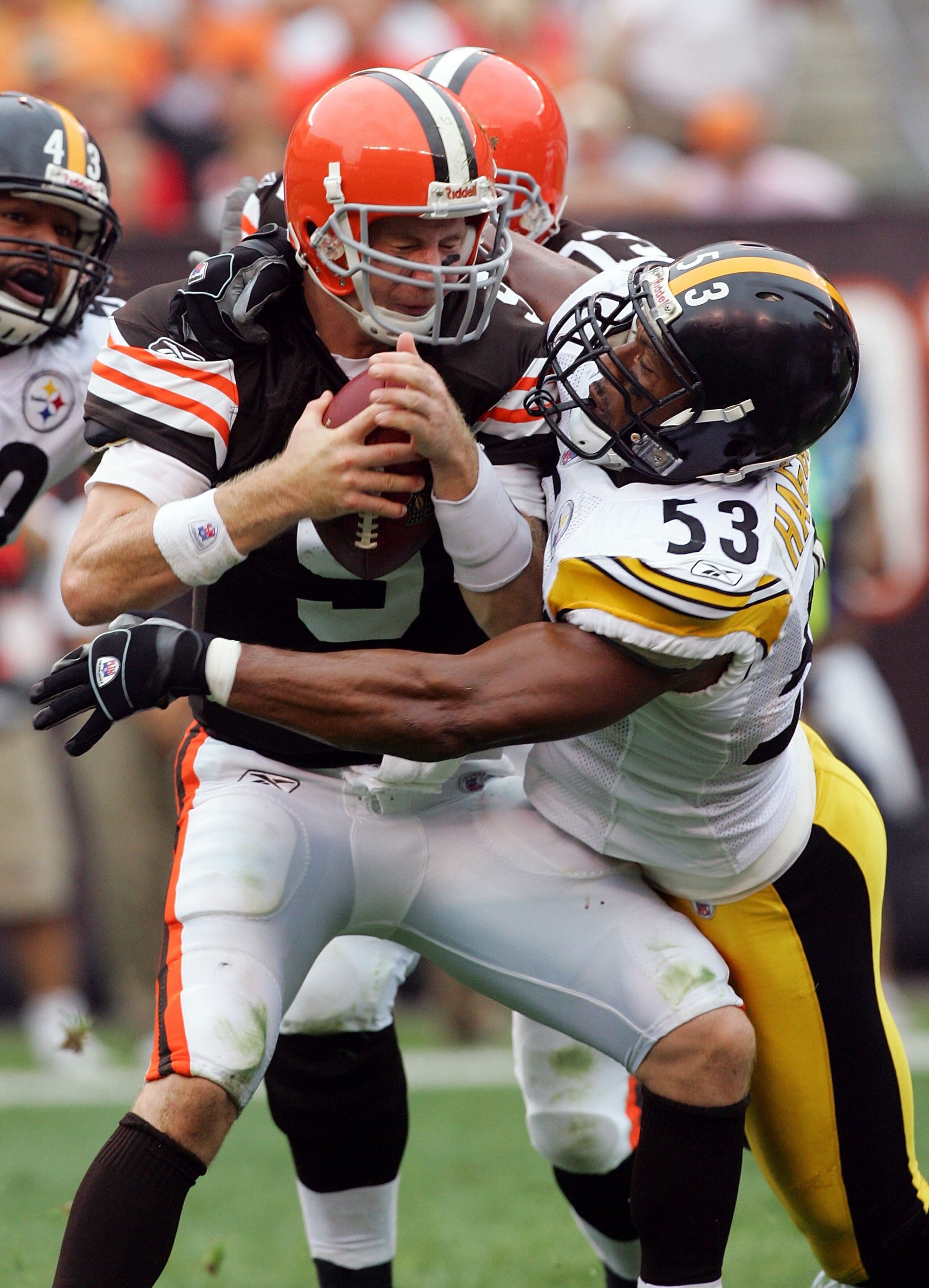 CLEVELAND - SEPTEMBER 9:  Charlie Frye #9 of the Cleveland Browns is sacked by Clark Haggans #53 of the Pittsburgh Steelers during their season opening game at Cleveland Browns Stadium September 9, 2007 in Cleveland, Ohio.  (Photo by Jim McIsaac/Getty Ima