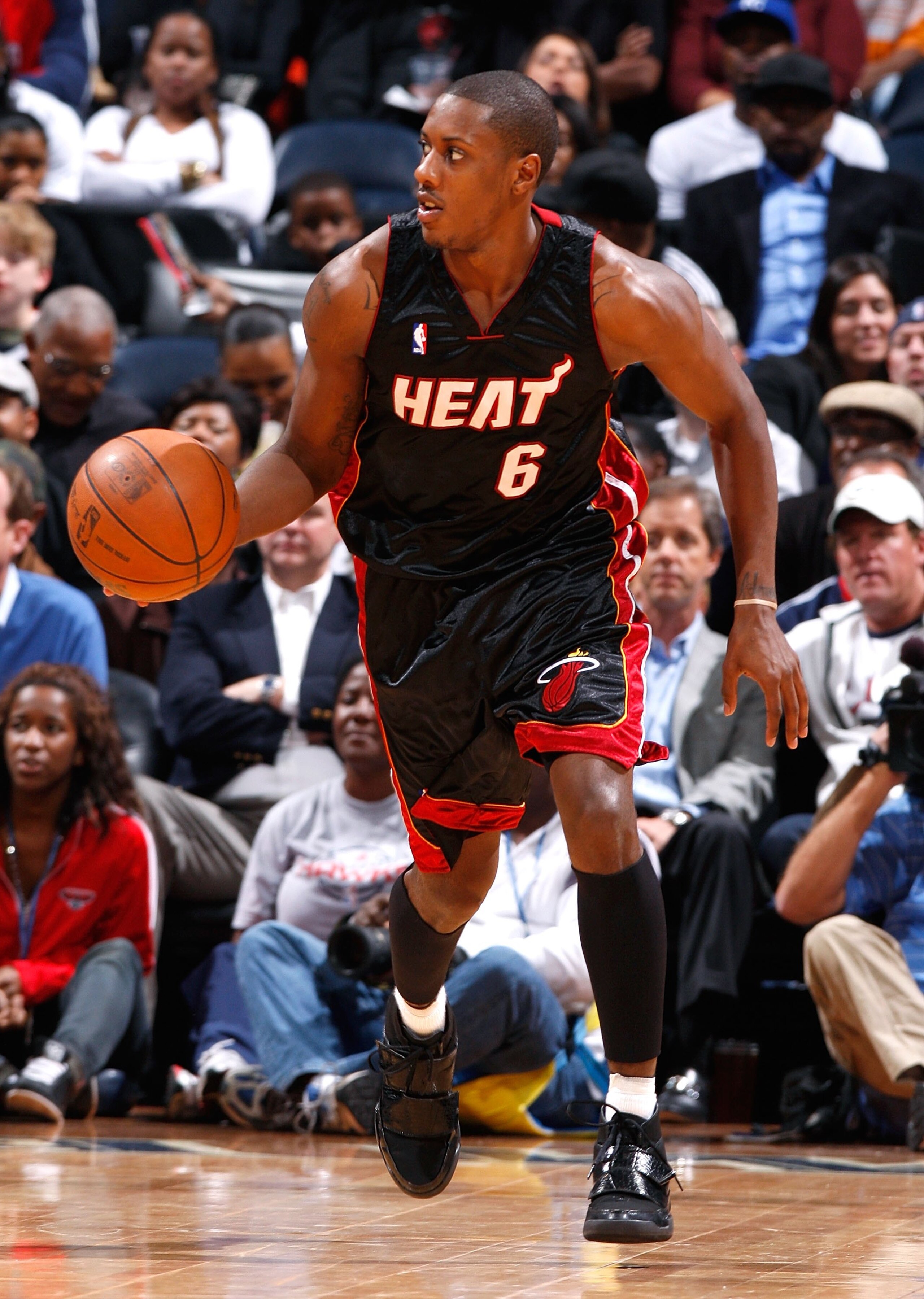 ATLANTA - NOVEMBER 18: Mario Chalmers #6 of the Miami Heat against the Atlanta Hawks at Philips Arena on November 18, 2009 in Atlanta, Georgia. (Photo by Kevin C. Cox/Getty Images) ATLANTA - NOVEMBER 18: Mario Chalmers #6 of the Miami Heat against the Atlanta Hawks at Philips Arena on November 18, 2009 in Atlanta, Georgia. (Photo by Kevin C. Cox/Getty Images)