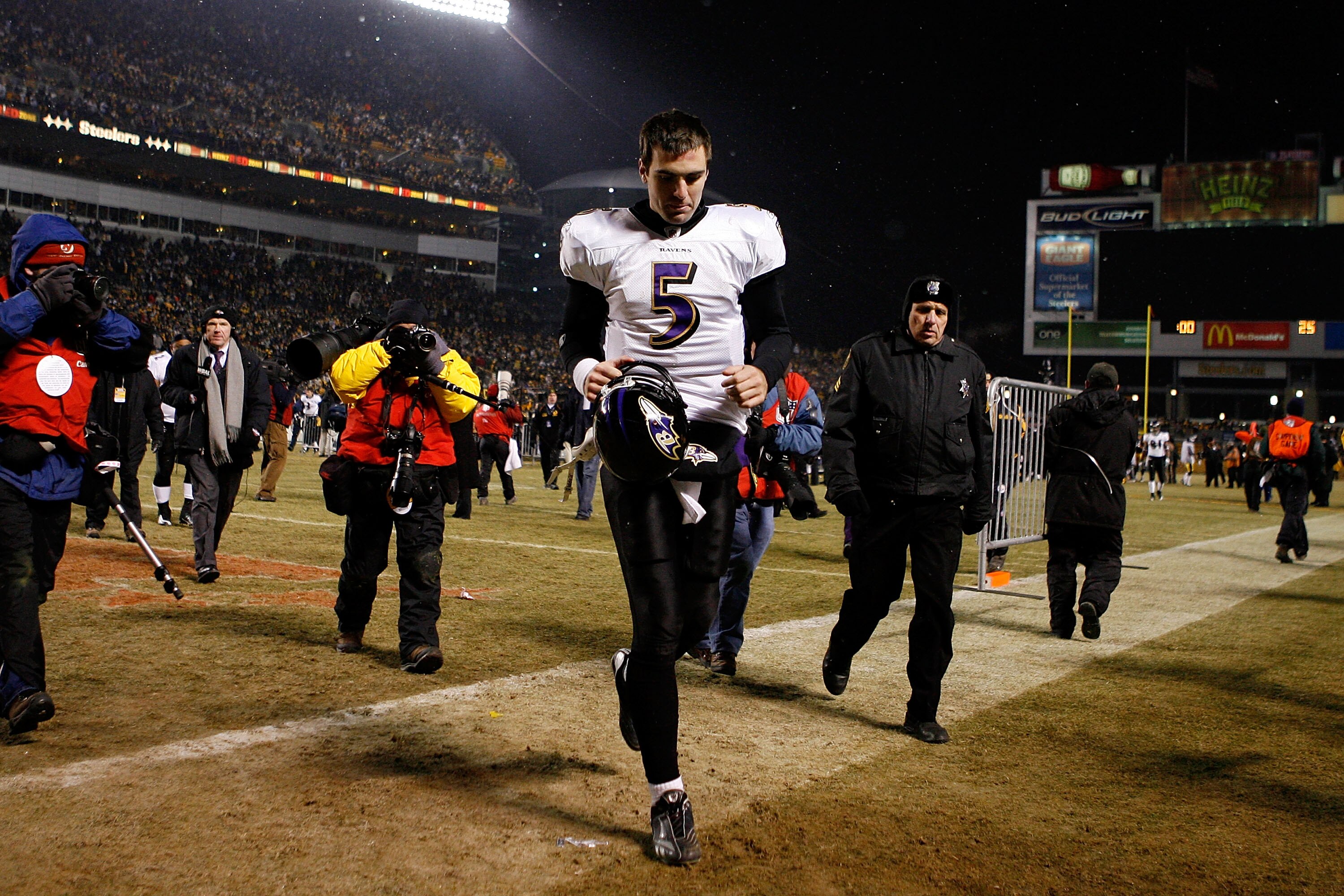 PITTSBURGH - JANUARY 18:  Quarterback Joe Flacco #5 of the Baltimore Ravens walks off the field after a loss 23-14 to the Pittsburgh Steelers during the AFC championship game on January 18, 2009 at Heinz Field in Pittsburgh, Pennsylvania.  (Photo by Grego