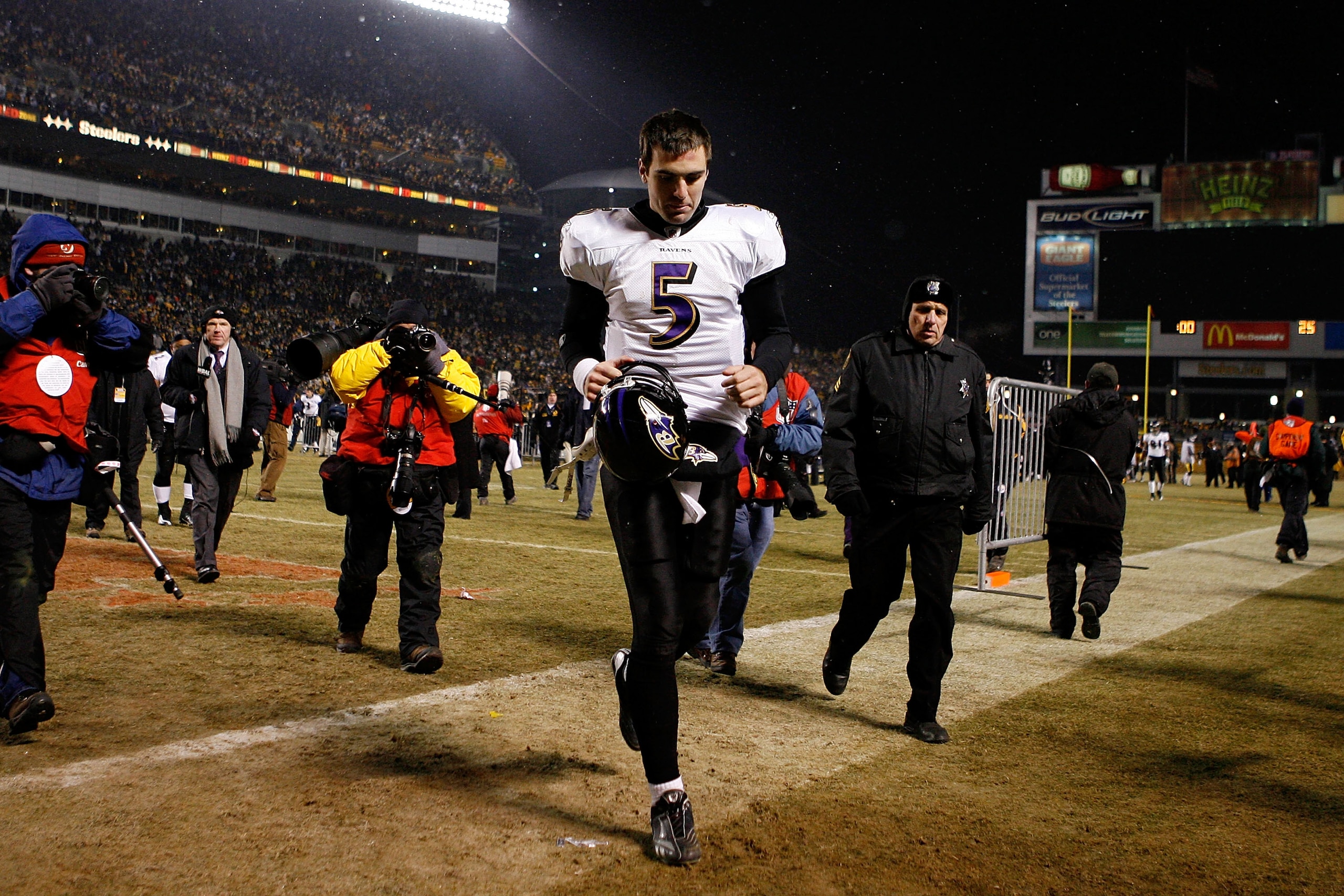 PITTSBURGH - JANUARY 18:  Quarterback Joe Flacco #5 of the Baltimore Ravens walks off the field after a loss 23-14 to the Pittsburgh Steelers during the AFC championship game on January 18, 2009 at Heinz Field in Pittsburgh, Pennsylvania.  (Photo by Grego