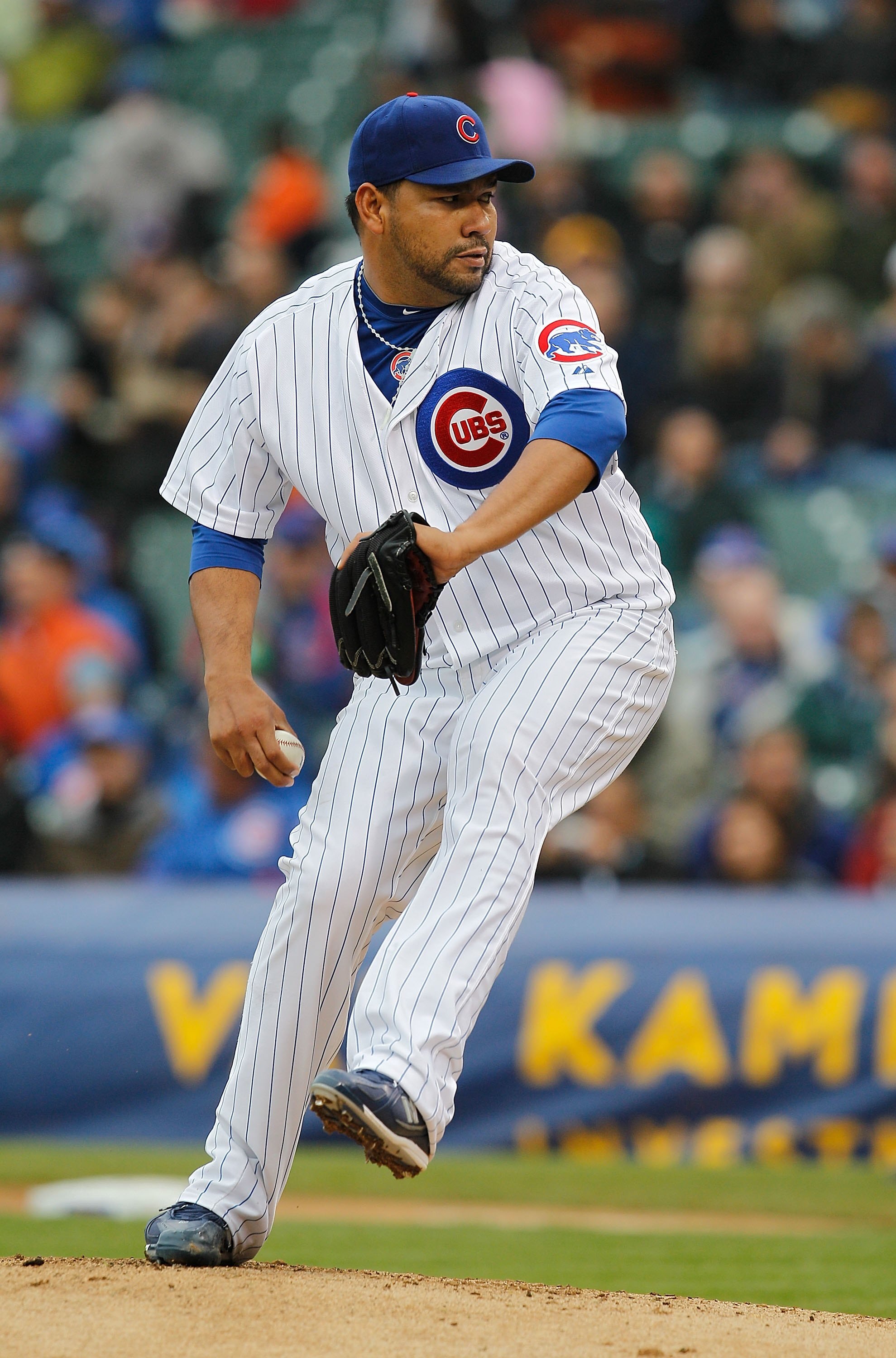 CHICAGO - MAY 12: Starting pitcher Carlos Silva #52 of the Chicago Cubs delivers the ball against the Florida Marlins at Wrigley Field on May 12, 2010 in Chicago, Illinois. The Cubs defeated the Marlins 4-3.  (Photo by Jonathan Daniel/Getty Images)