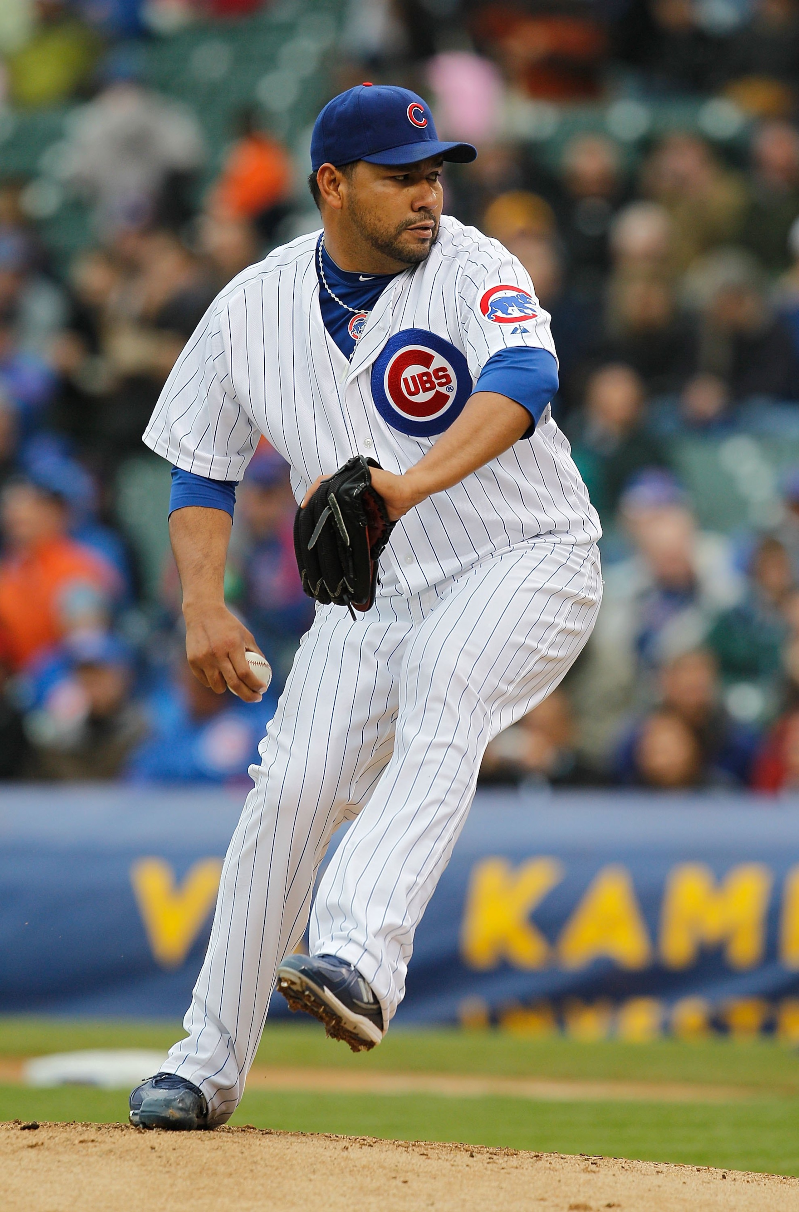 CHICAGO - MAY 12: Starting pitcher Carlos Silva #52 of the Chicago Cubs delivers the ball against the Florida Marlins at Wrigley Field on May 12, 2010 in Chicago, Illinois. The Cubs defeated the Marlins 4-3.  (Photo by Jonathan Daniel/Getty Images)