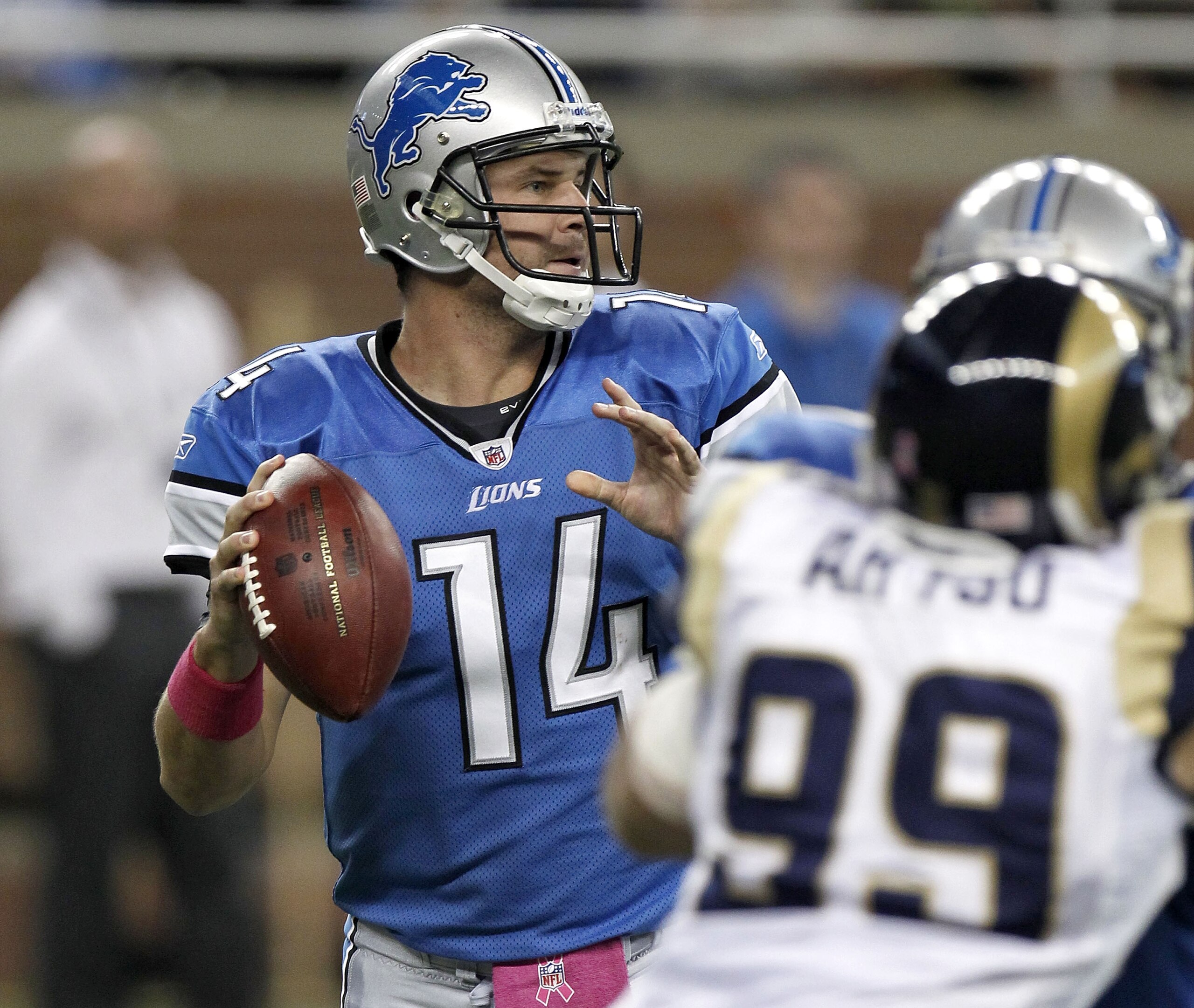 DETROIT - OCTOBER 10: Shaun Hill #14 of the Detroit Lions looks for a open receiver while playing the St. Louis Rams on October 10, 2010 at Ford Field in Detroit, Michigan.  (Photo by Gregory Shamus/Getty Images)