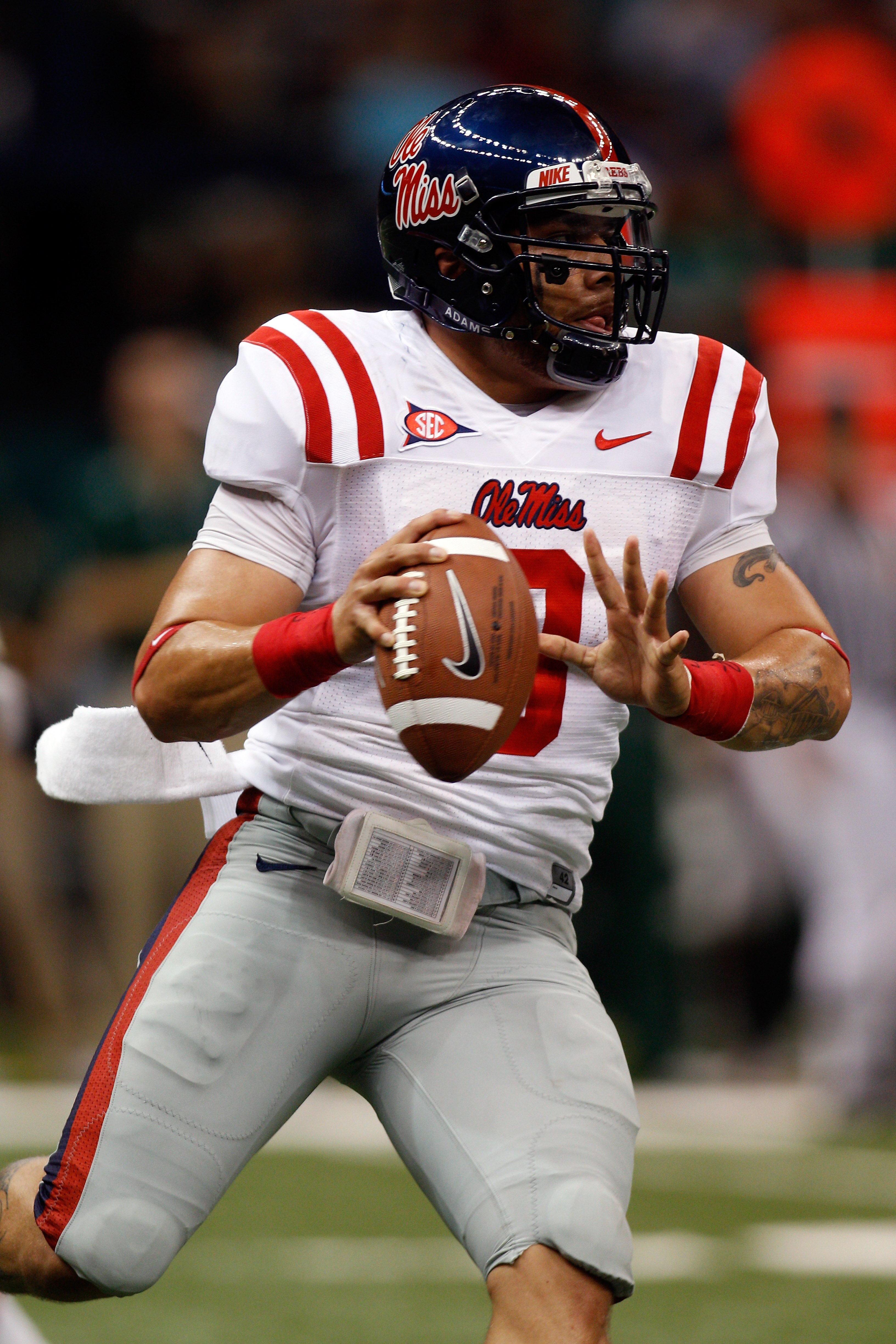 NEW ORLEANS - SEPTEMBER 11:  Jeremiah Masoli #8 of the Ole Miss Rebels in action against the the Tulane Green Wave at the Louisiana Superdome on September 11, 2010 in New Orleans, Louisiana.  Ole Miss defeated Tulane 27-13.  (Photo by Chris Graythen/Getty