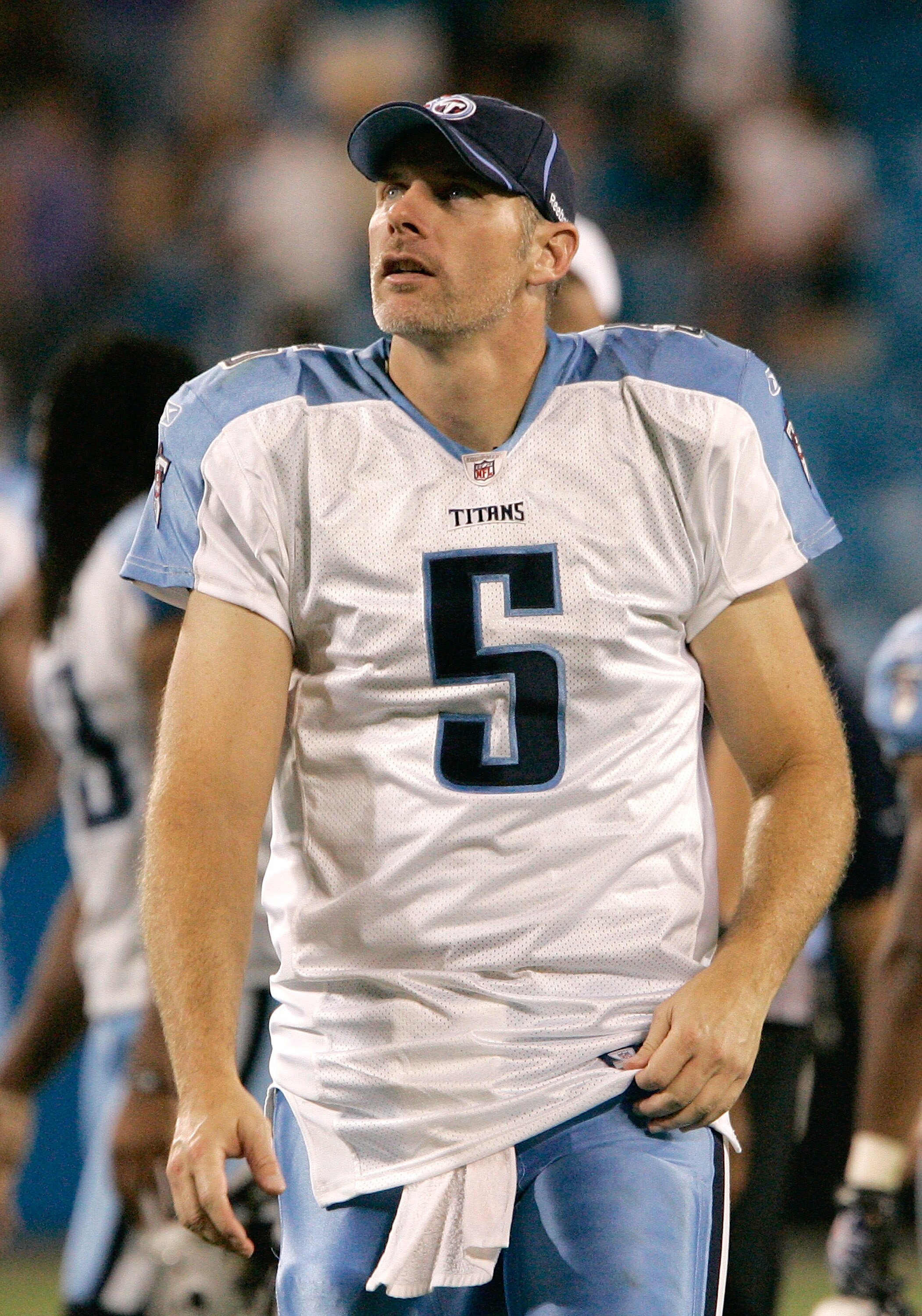 CHARLOTTE, NC - AUGUST 28: Quarterback Kerry Collins #5 of the Tennessee Titans looks up at the stands as he leaves the stadium after their preseason game against the Carolina Panthers at Bank of America Stadium on August 28, 2010 in Charlotte, North Caro