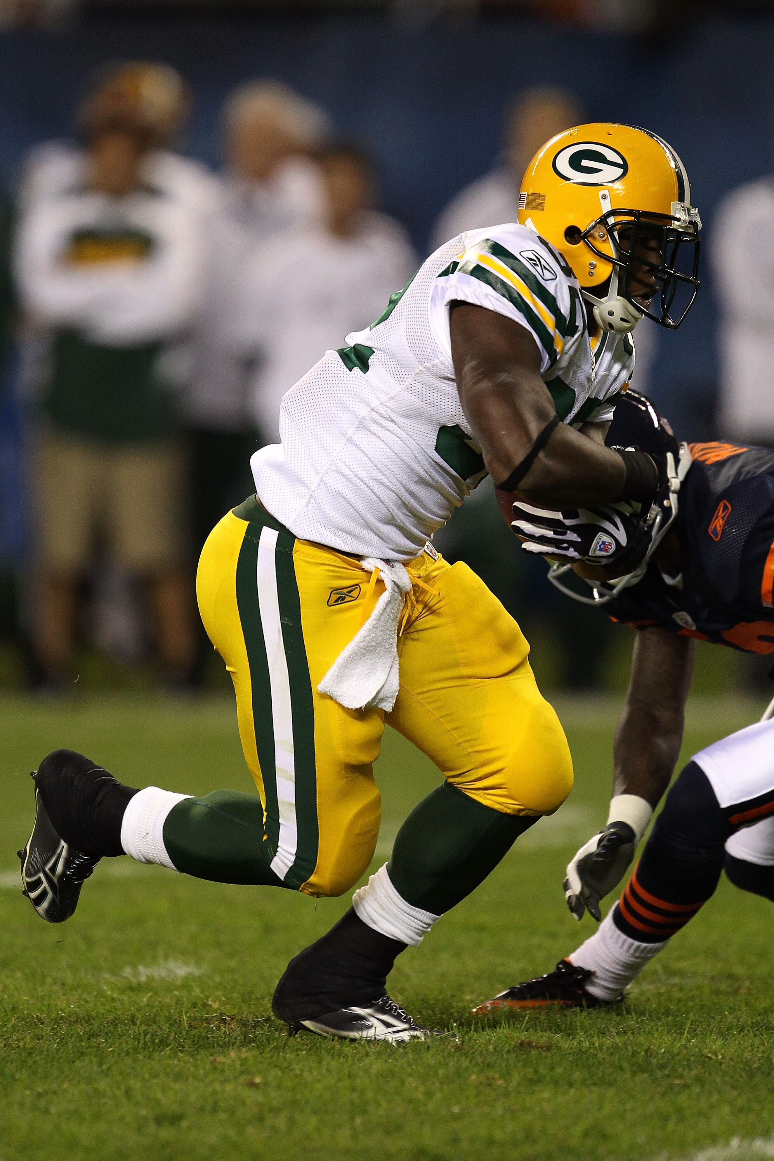 CHICAGO - SEPTEMBER 27:  Brandon Jackson #32 of the Green Bay Packers runs the ball against the Chicago Bears at Soldier Field on September 27, 2010 in Chicago, Illinois.  (Photo by Jonathan Daniel/Getty Images)