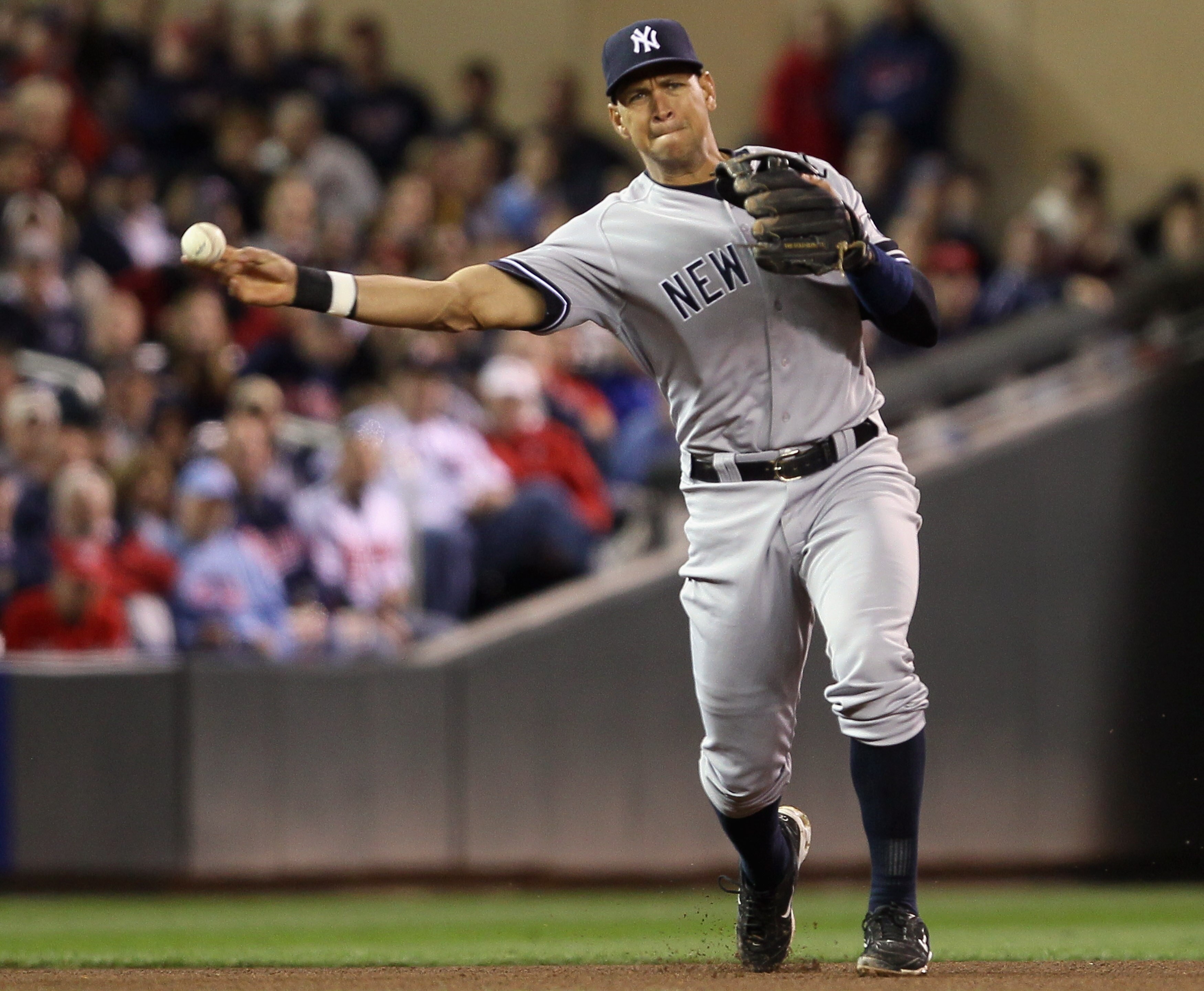 MINNEAPOLIS - OCTOBER 06:  Alex Rodriguez #13 of the New York Yankees sends the ball to first for the out against the Minnesota Twins during game one of the ALDS on October 6, 2010 at Target Field in Minneapolis, Minnesota.  (Photo by Elsa/Getty Images)