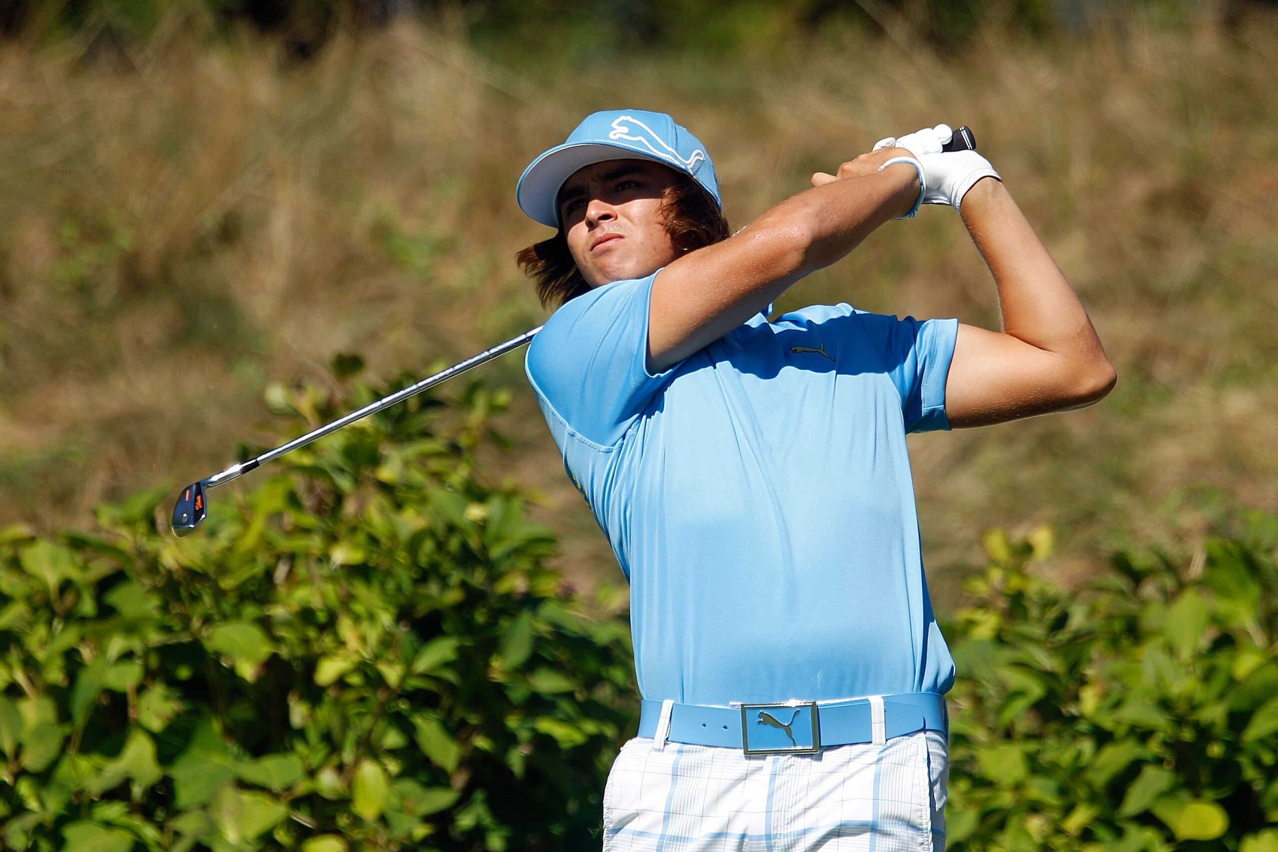 PARAMUS, NJ - AUGUST 27:  Rickie Fowler watches his tee shot on the eighth hole during the second round of The Barclays at the Ridgewood Country Club on August 27, 2010 in Paramus, New Jersey.  (Photo by Scott Halleran/Getty Images)
