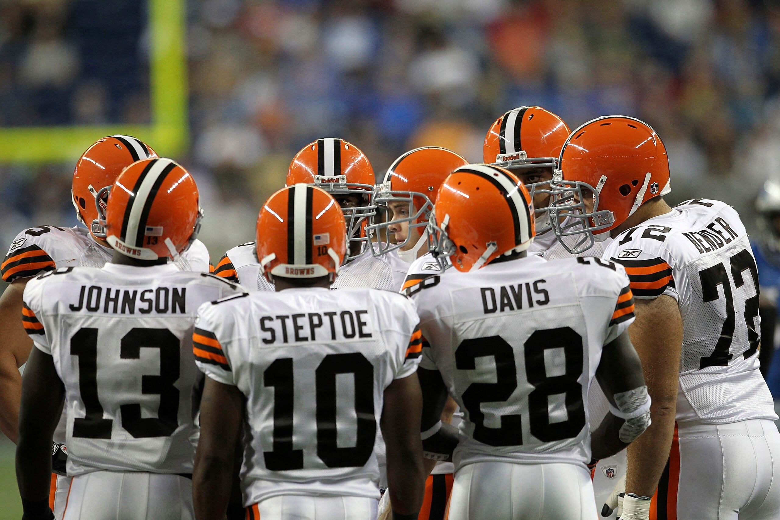 DETROIT - AUGUST 28: Colt McCoy #12 of the Cleveland Browns calls the play  in the huddle during the fourth quarter of the preseason game against the Detroit Lions at Ford Field on August 28, 2010 in Detroit, Michigan. The Lions defeated the Browns 35-27.