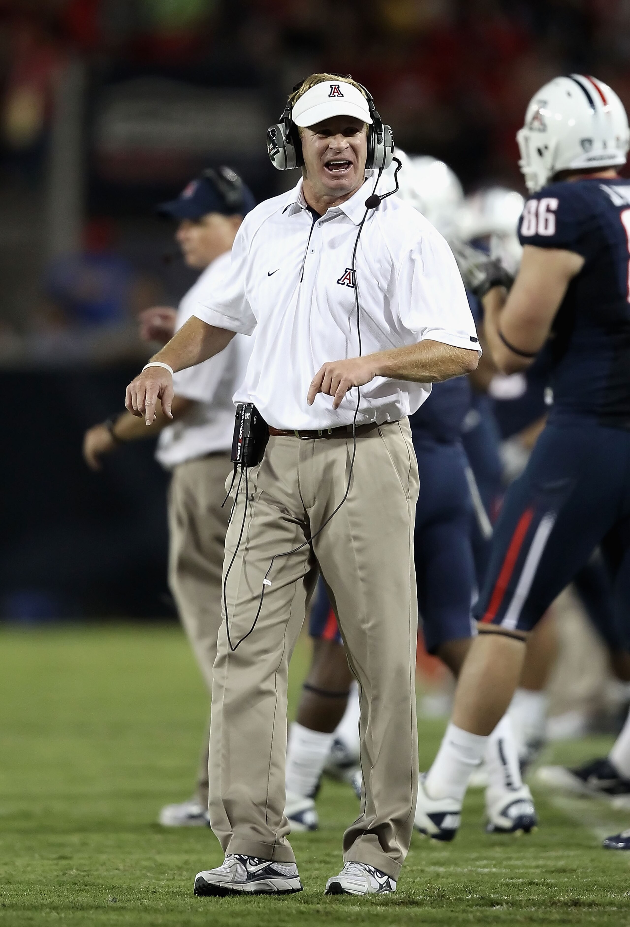 TUCSON, AZ - OCTOBER 09:  Head coach Mike Stoops of the Arizona Wildcats watches from the sidelines during the college football game against the Oregon State Beavers at Arizona Stadium on October 9, 2010 in Tucson, Arizona.  The Beavers defeated the Wildc