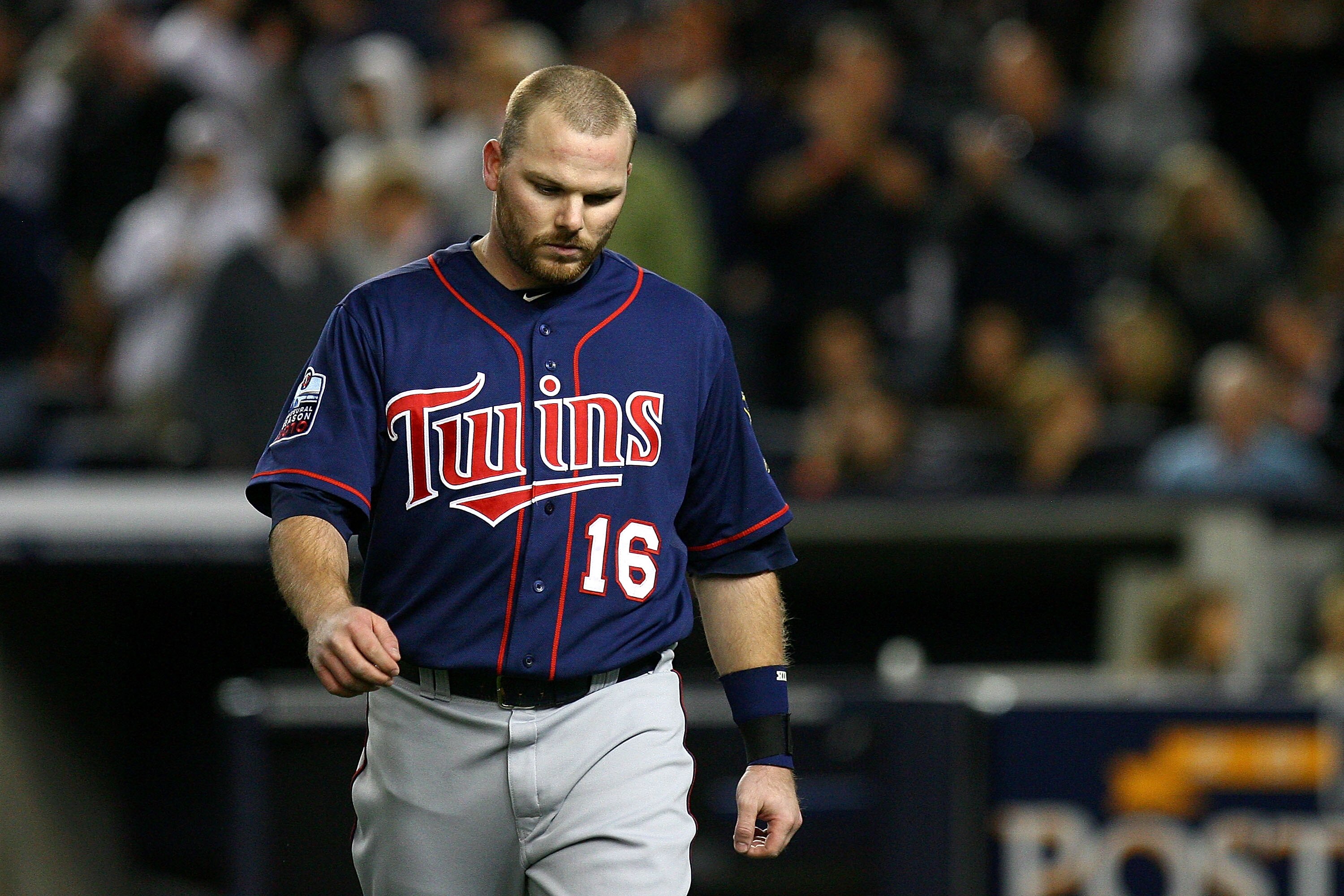 NEW YORK - OCTOBER 09:  Jason Kubel #16 of the Minnesota Twins reacts as he walsk back to the dugout after he struck out in the top of the sixth inning against the New York Yankees  during Game Three of the ALDS part of the 2010 MLB Playoffs at Yankee Sta