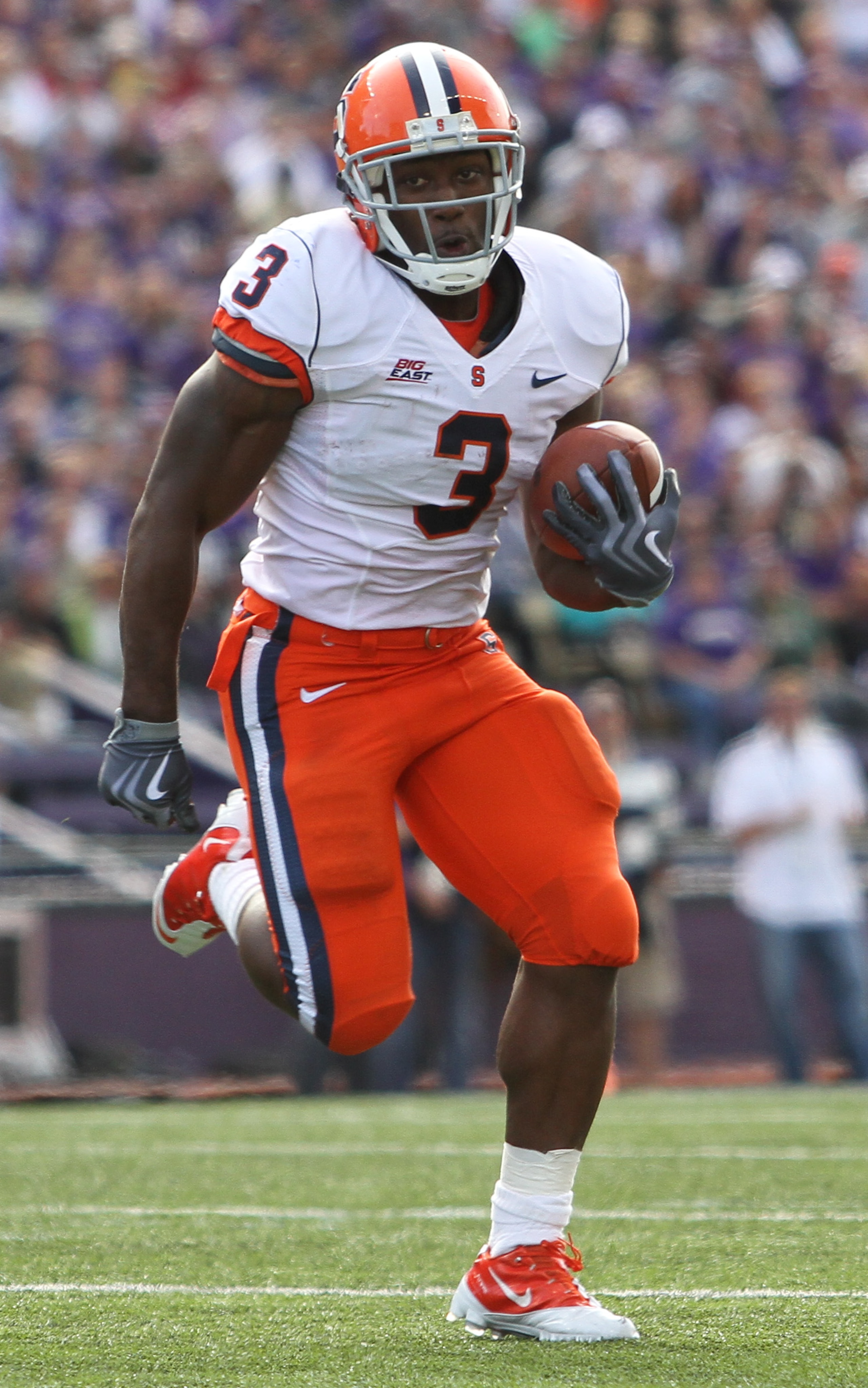 SEATTLE - SEPTEMBER 11:  Running back Delone Carter #3 of the Syracuse Orange rushes against the Washington Huskies on September 11, 2010 at Husky Stadium in Seattle, Washington. (Photo by Otto Greule Jr/Getty Images)