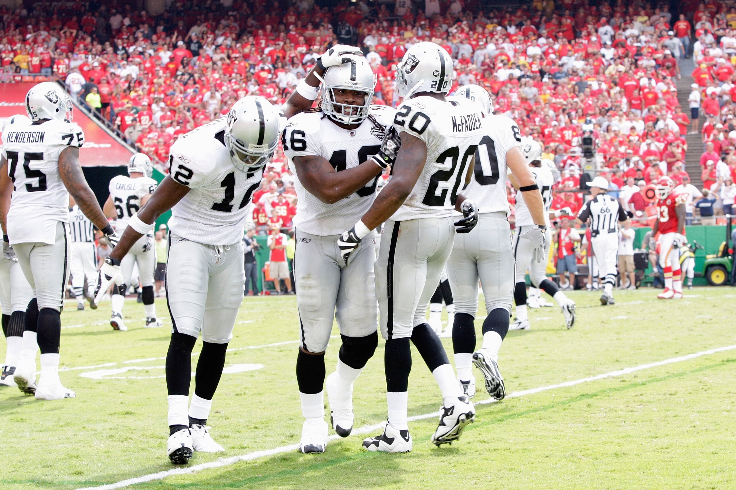 KANSAS CITY, MO - SEPTEMBER 20:  Darrius Heyward-Bey #12, Oren O'Neal #46 and Darren McFadden #20 of the Oakland Raiders walk off the field during the game against the Kansas City Chiefs at Arrowhead Stadium on September 20, 2009 in Kansas City, Missouri.