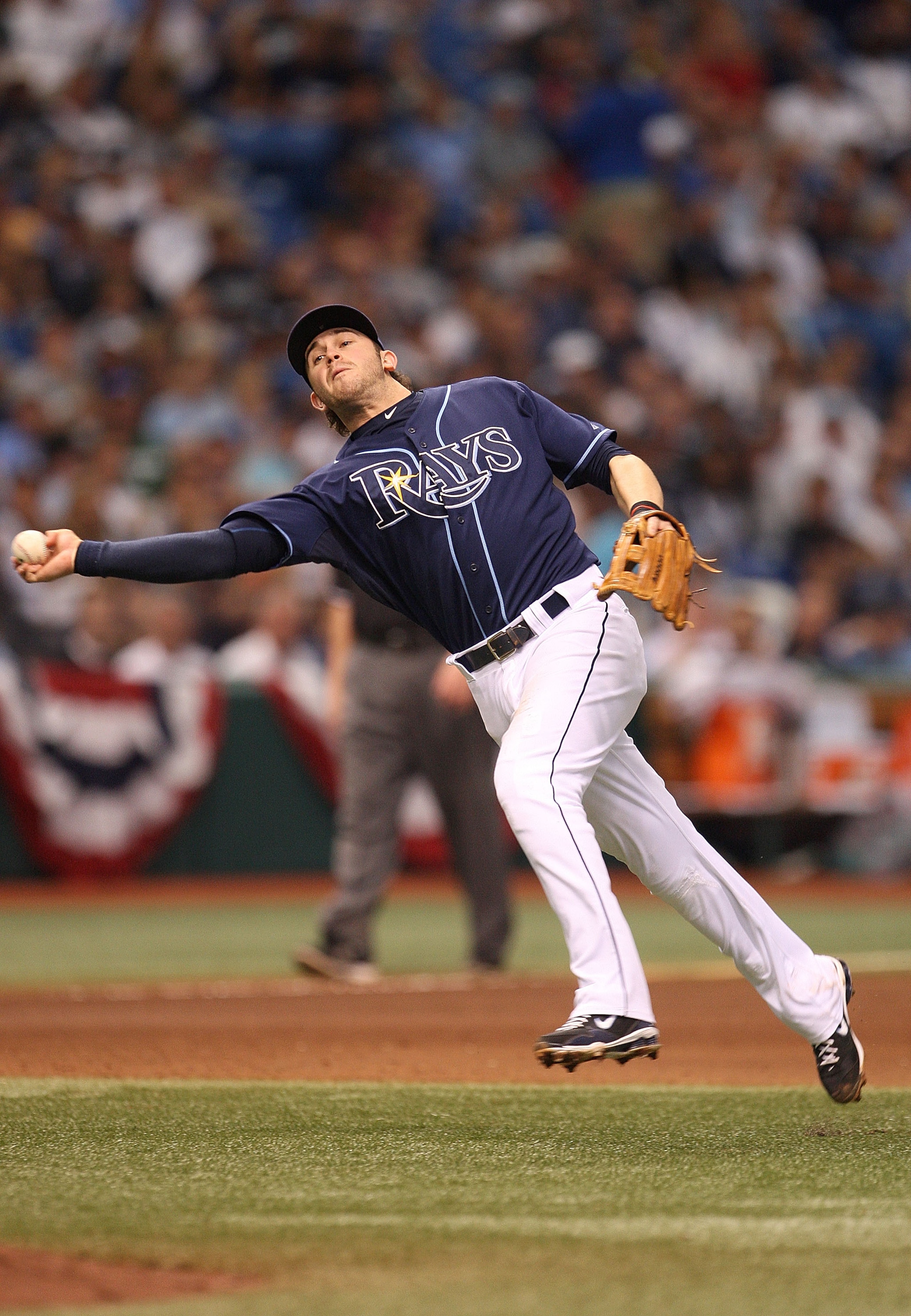 ST PETERSBURG, FL - OCTOBER 07: Evan Longoria #3 of the Tampa Bay Rays makes a throw to first during Game 2 of the ALDS against the Texas Rangers at Tropicana Field on October 7, 2010 in St. Petersburg, Florida. (Photo by Mike Ehrmann/Getty Images) ST PETERSBURG, FL - OCTOBER 07: Evan Longoria #3 of the Tampa Bay Rays makes a throw to first during Game 2 of the ALDS against the Texas Rangers at Tropicana Field on October 7, 2010 in St. Petersburg, Florida. (Photo by Mike Ehrmann/Getty Images)