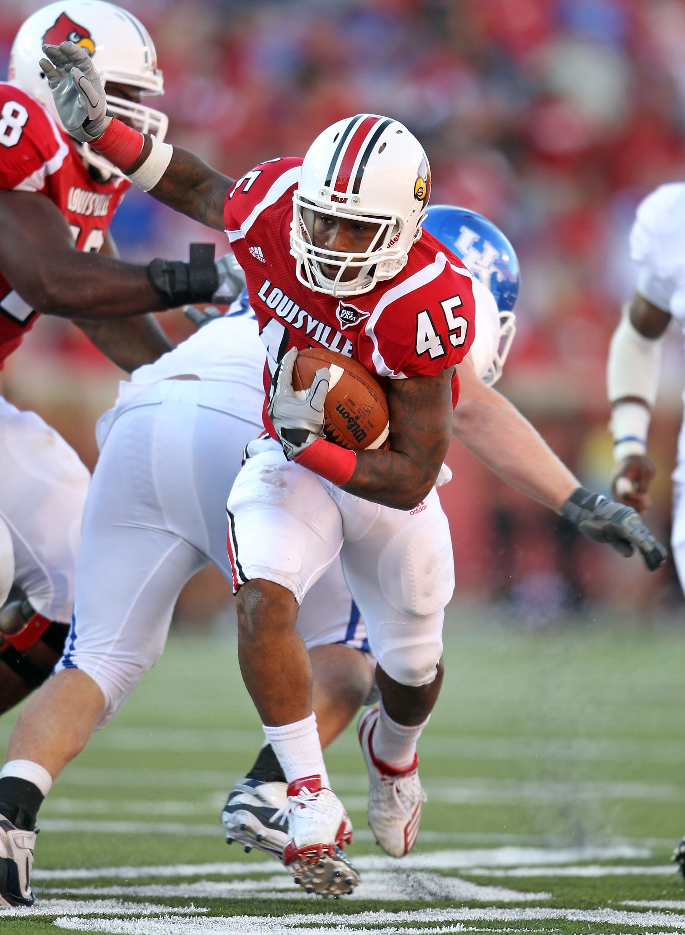 LOUISVILLE, KY - SEPTEMBER 04:  Blayne Donnell #45 of the Louisville Cardinals runs with the ball during the game against the Kentucky Wildcats at Papa John's Cardinal Stadium on September 4, 2010 in Louisville, Kentucky.  (Photo by Andy Lyons/Getty Image