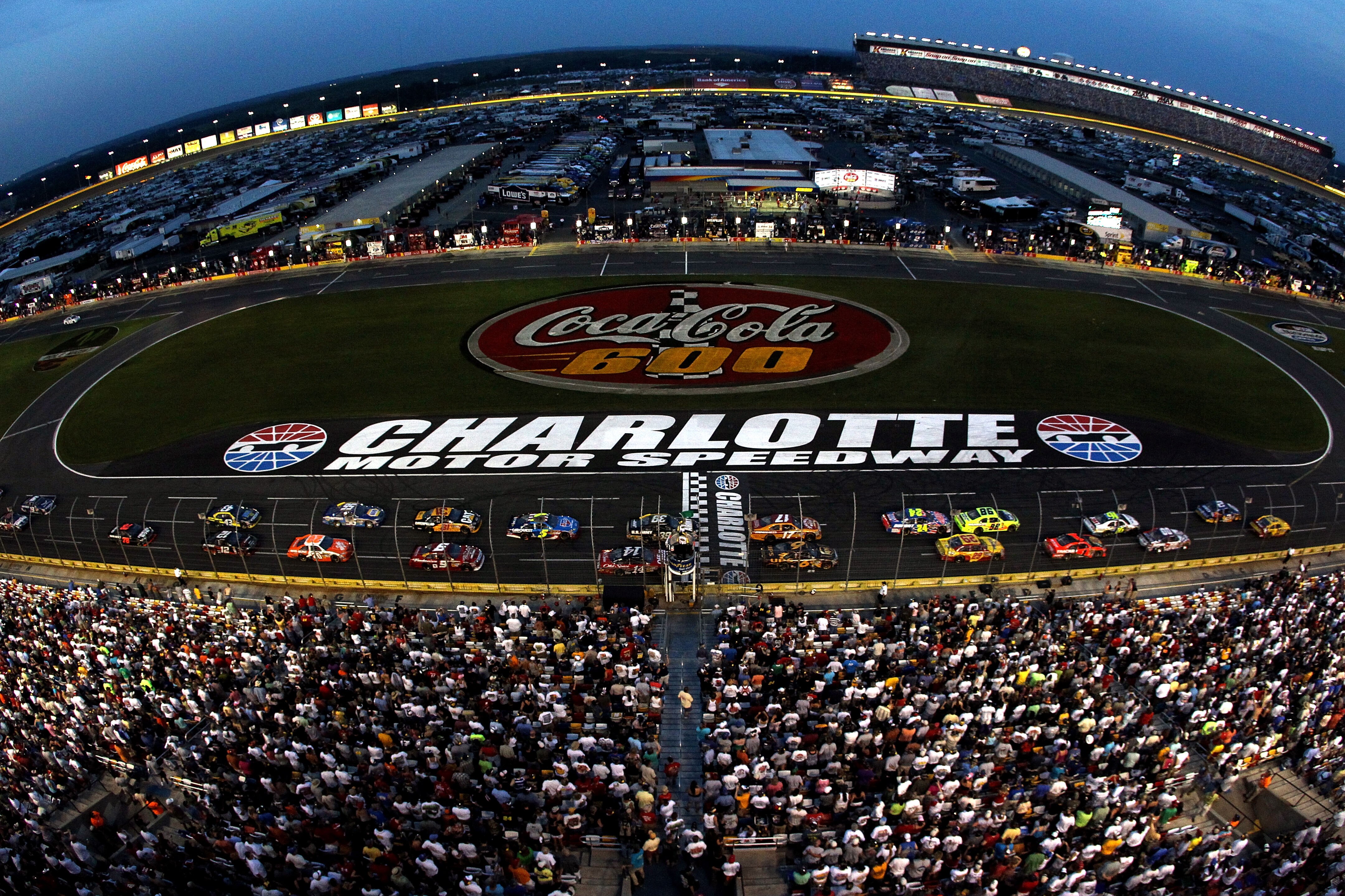CONCORD, NC - MAY 30:  Kurt Busch, driver of the #2 Miller Lite/Vortex Dodge, and Clint Bowyer, driver of the #33 Cheerios/Hamburger Helper Chevrolet, lead the field during the NASCAR Sprint Cup Series Coca-Cola 600 at Charlotte Motor Speedway on May 30,
