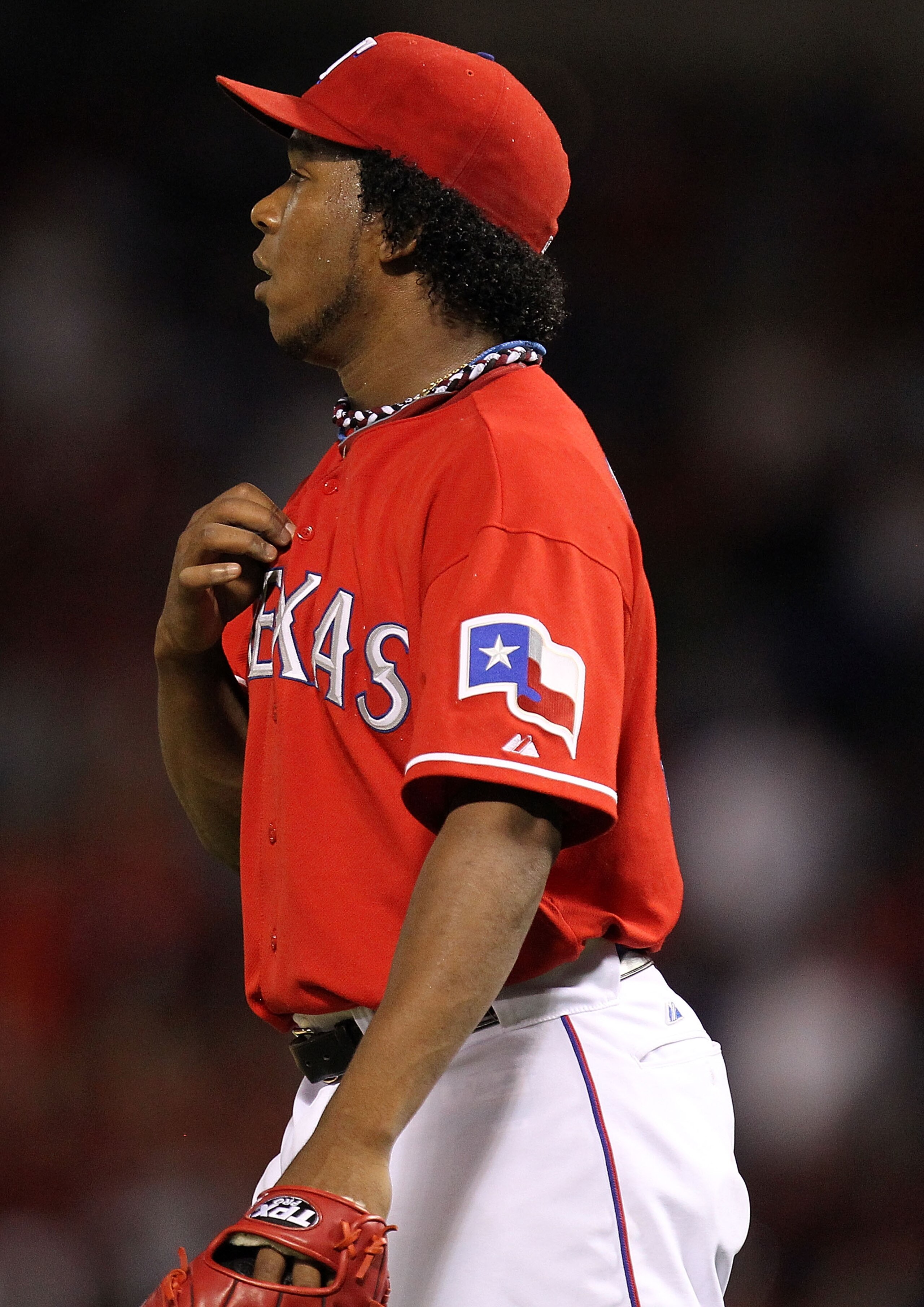 ARLINGTON, TX - OCTOBER 09:  Pitcher Neftali Feliz #30 of the Texas Rangers reacts after giving up a homerun to Carl Crawford #13 of the Tampa Bay Rays in the 9th inning during game 3 of the ALDS at Rangers Ballpark in Arlington on October 9, 2010 in Arli
