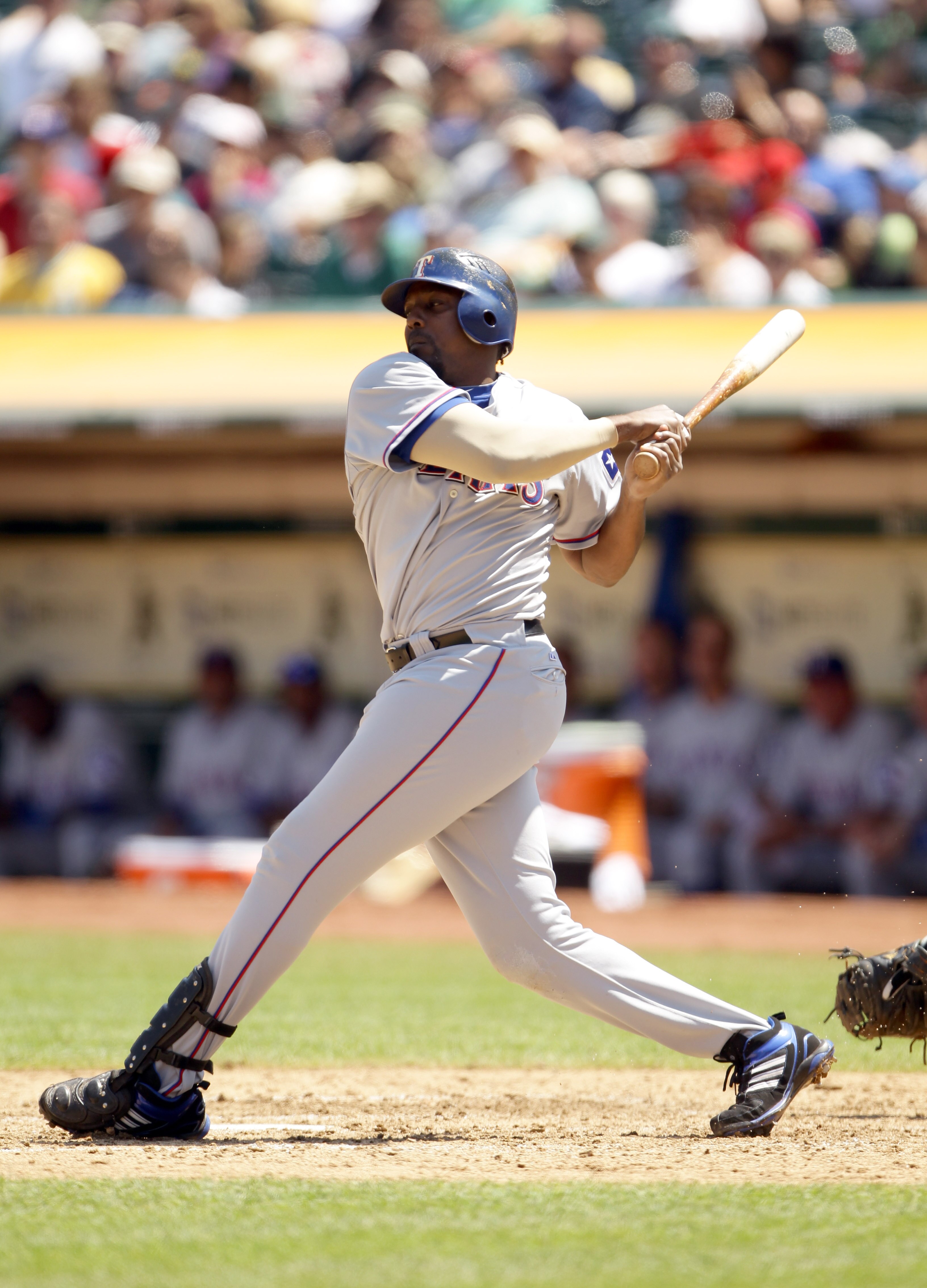 OAKLAND, CA - AUGUST 07:  Vladimir Guerrero #27 of the Texas Rangers bats against the Oakland Athletics at the Oakland-Alameda County Coliseum on August 7, 2010 in Oakland, California.  (Photo by Ezra Shaw/Getty Images)