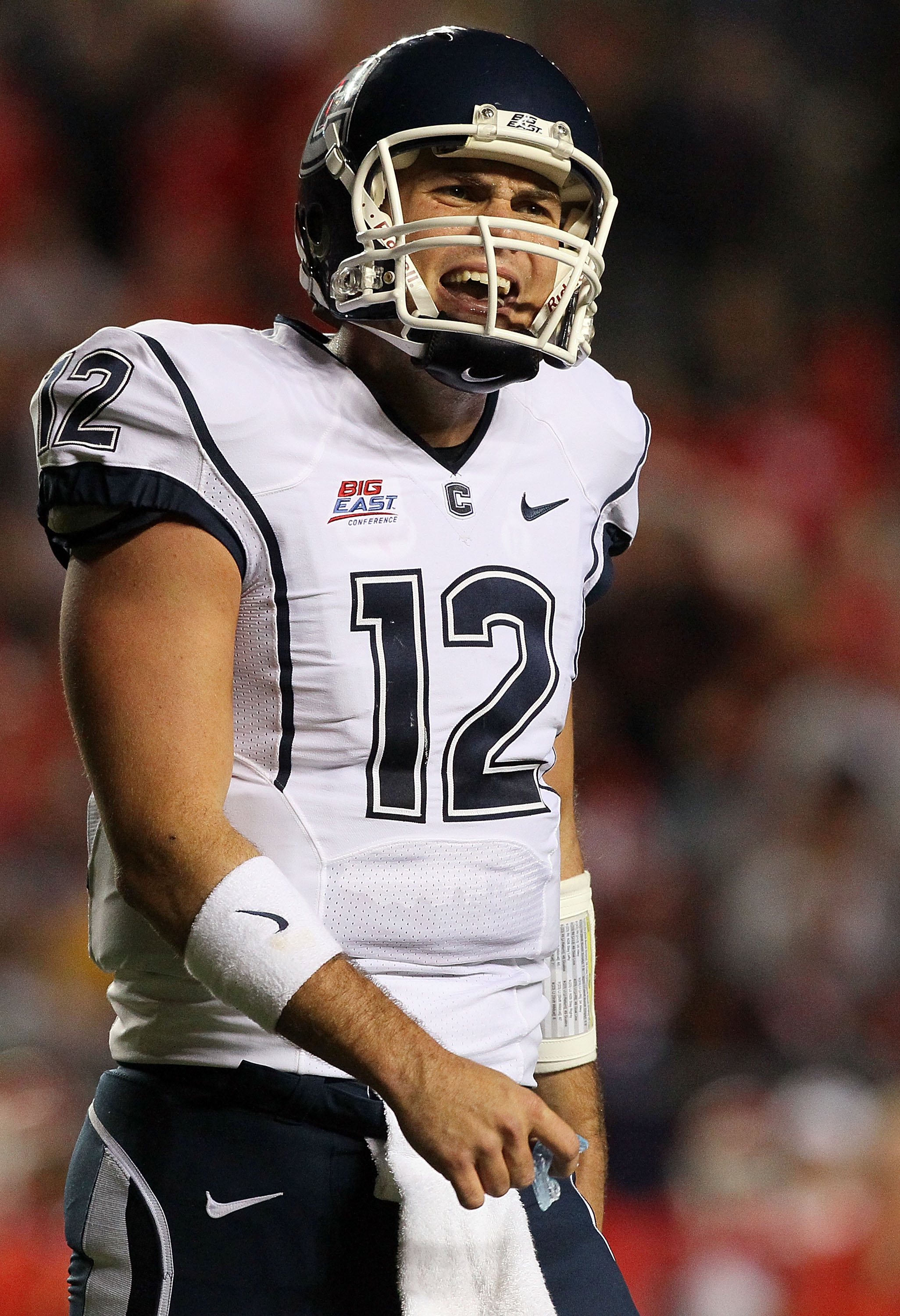 PISCATAWAY, NJ - OCTOBER 08:  Cody Endres #12 of the Connecticut Huskies reacts against the Rutgers Scarlet Knights at Rutgers Stadium on October 8, 2010 in Piscataway, New Jersey.  (Photo by Jim McIsaac/Getty Images)