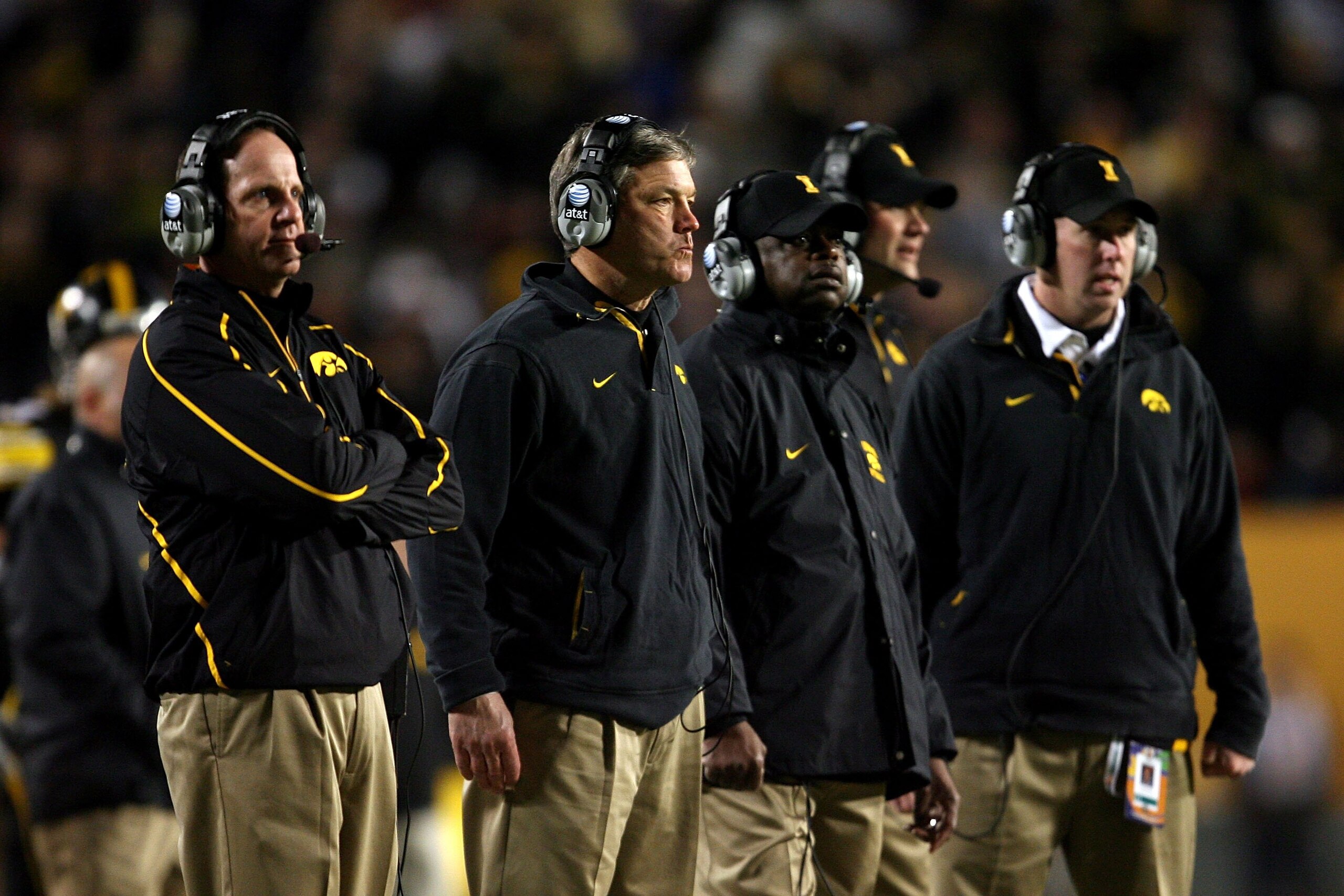MIAMI GARDENS, FL - JANUARY 05:  Head coach Kirk Ferentz  (2nd L) of the Iowa Hawkeyes looks on along with some of his assistant coaches against the Georgia Tech Yellow Jackets during the FedEx Orange Bowl at Land Shark Stadium on January 5, 2010 in Miami