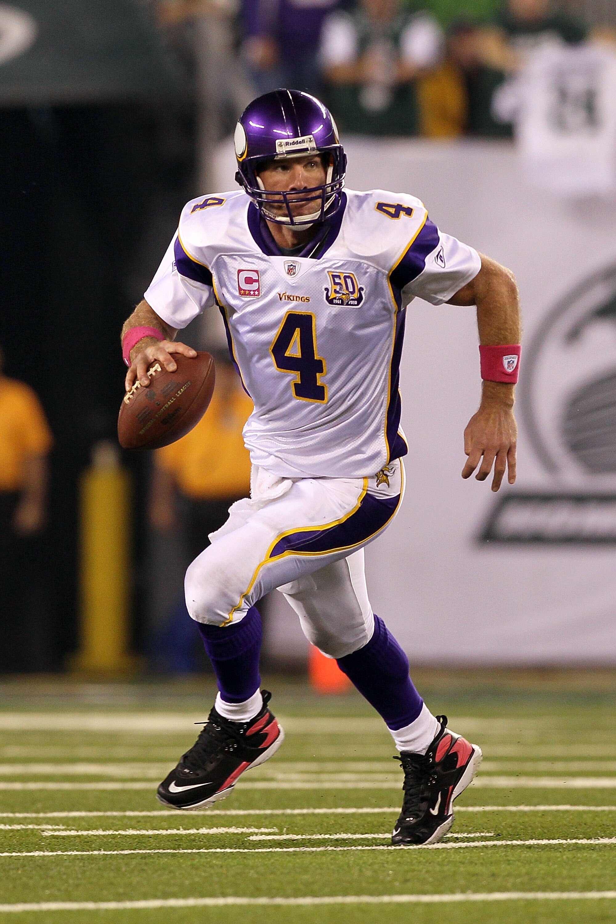 EAST RUTHERFORD, NJ - OCTOBER 11:  Quarterback Brett Favre #4 of the Minnesota Vikings looks to pass in the first half against the New York Jets at New Meadowlands Stadium on October 11, 2010 in East Rutherford, New Jersey.  (Photo by Jim McIsaac/Getty Im