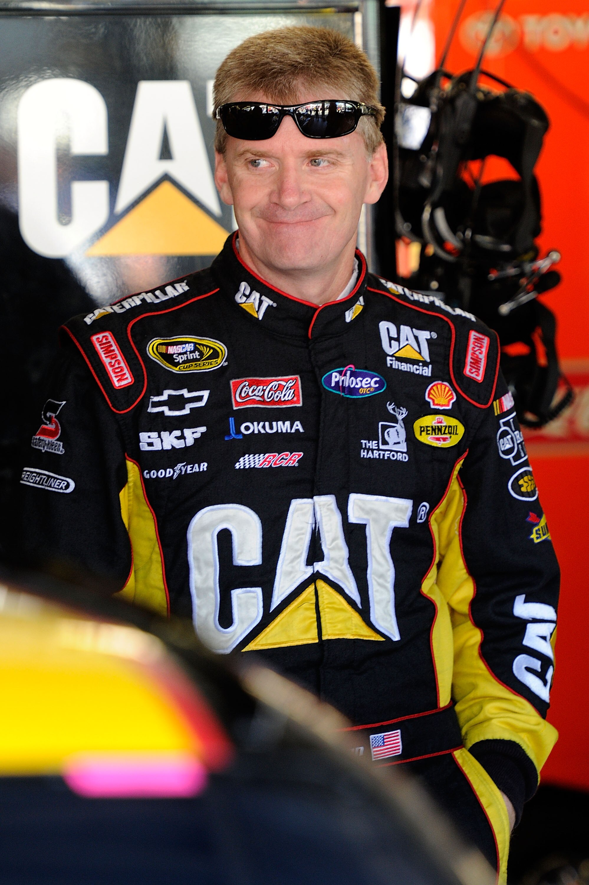 KANSAS CITY, KS - OCTOBER 02:  Jeff Burton, driver of the #31 Caterpilliar Chevrolet, stands in the garage during practice for the NASCAR Sprint Cup Series Price Chopper 400 on October 2, 2010 in Kansas City, Kansas.  (Photo by John Harrelson/Getty Images