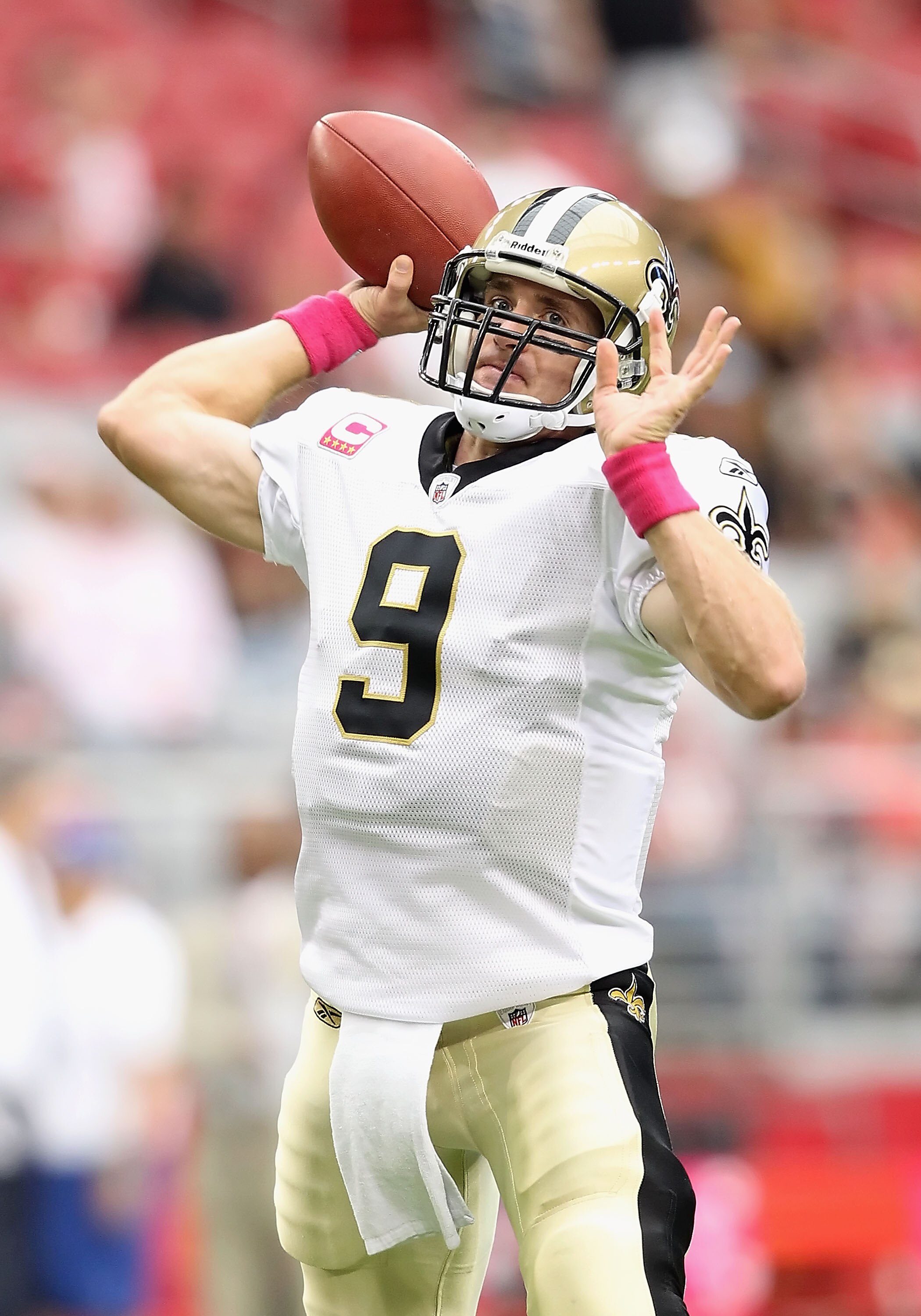 GLENDALE, AZ - OCTOBER 10:  Quarterback Drew Brees #9 of the New Orleans Saints warms up before the NFL game against the Arizona Cardinals at the University of Phoenix Stadium on October 10, 2010 in Glendale, Arizona. The Cardinals defeated the Saints 30-