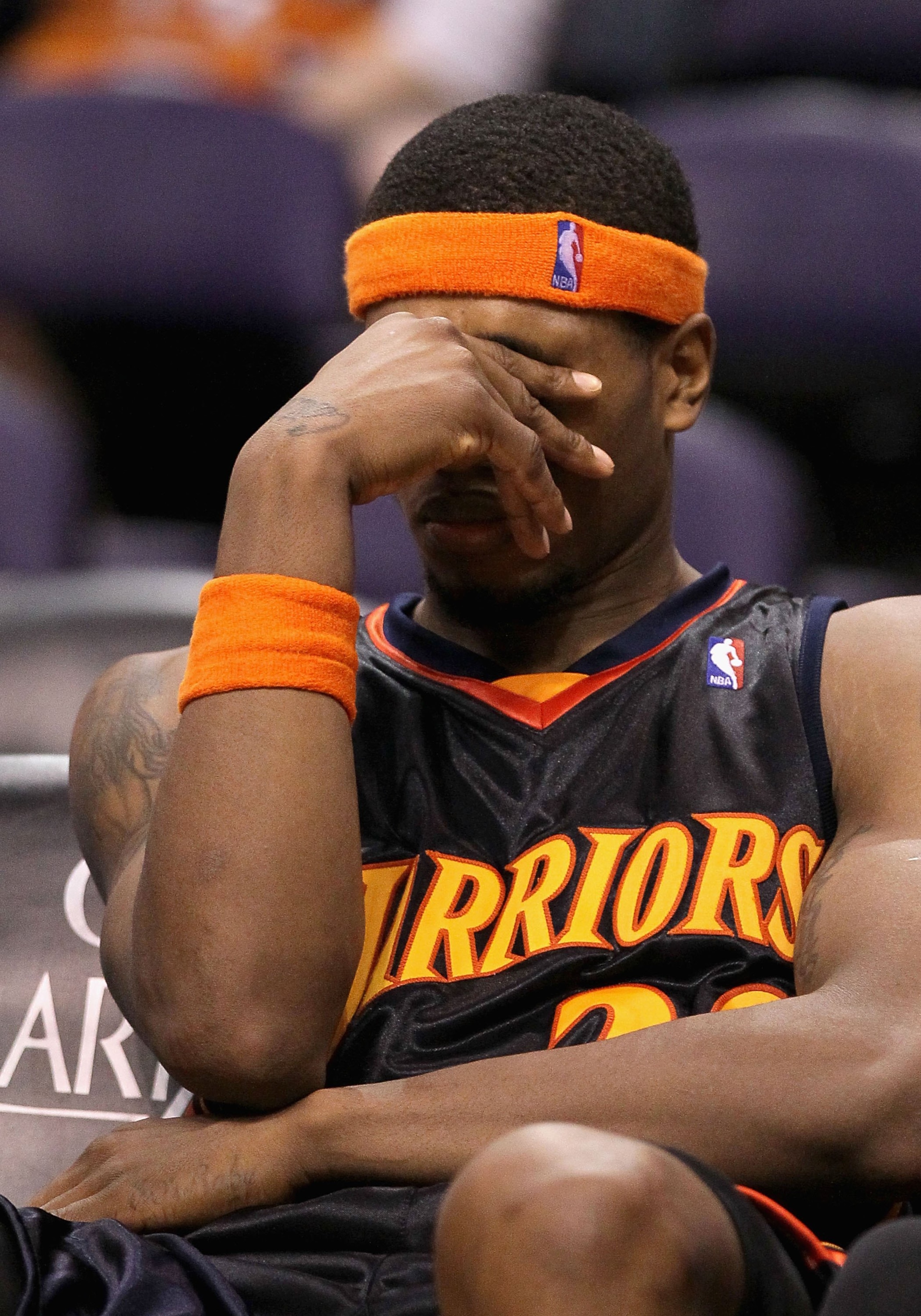 PHOENIX - JANUARY 23:  Cartier Martin #20 of the Golden State Warriors reacts on the bench during the NBA game against the Phoenix Suns at US Airways Center on January 23, 2010 in Phoenix, Arizona. The Suns defeated the Warriors 112-103.  NOTE TO USER: Us