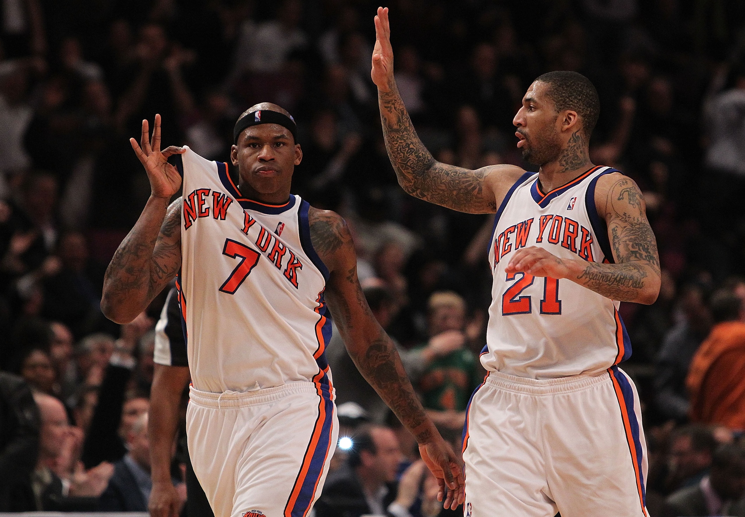 NEW YORK - JANUARY 28:  Al Harrington #7 of the New York Knicks celebrates a basket with teammate Wilson Chandler #21 against the Toronto Raptors at Madison Square Garden on January 28, 2010 in New York, New York. NOTE TO USER: User expressly acknowledges
