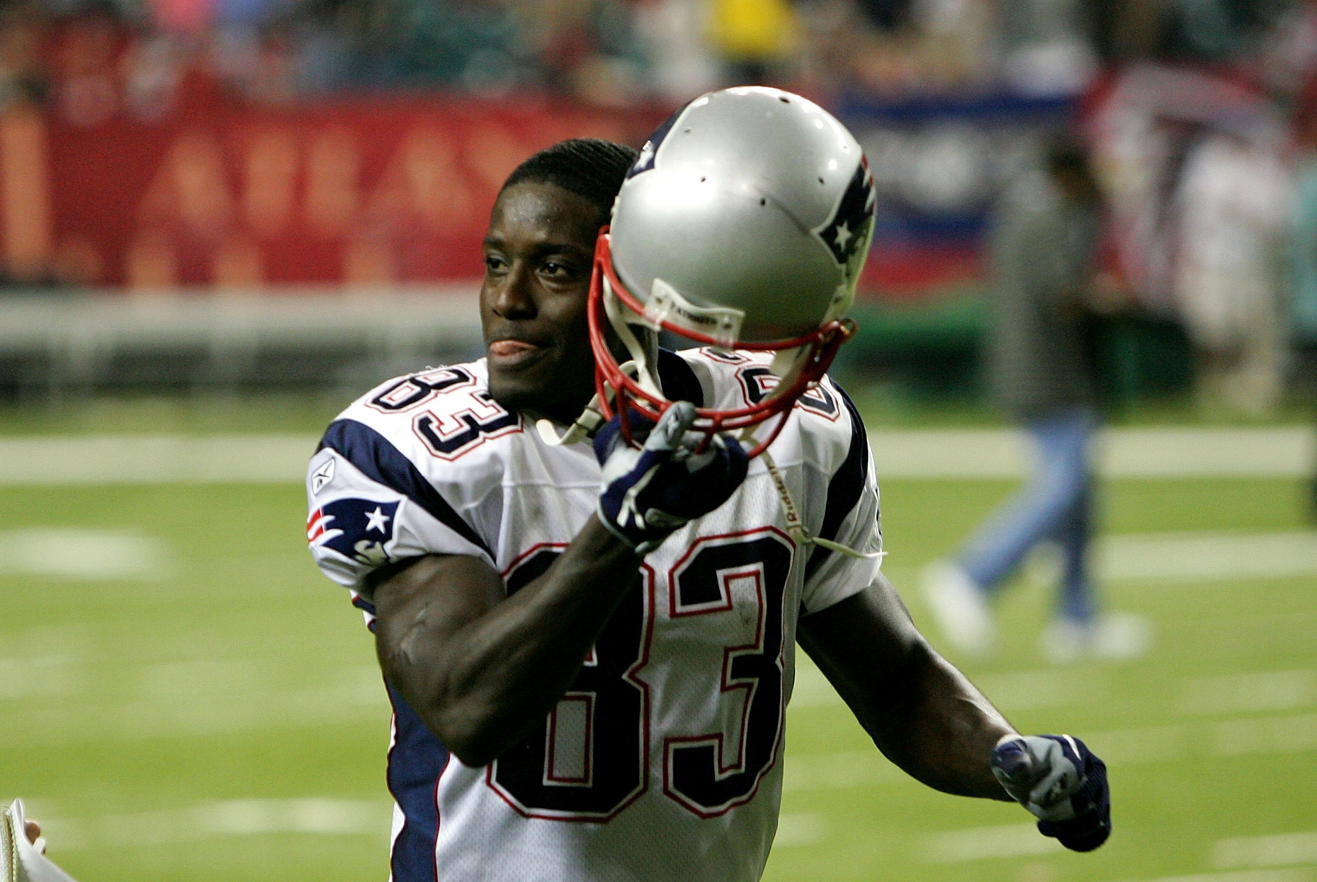 ATLANTA - OCTOBER 09:  Deion Branch #83 of the New England Patriots smiles as he walks off the field after defeating the Atlanta Falcons on October 9, 2005 at the Georgia Dome in Atlanta, Georgia. The Patriots defeated the Falcons 31-28.  (Photo by Street
