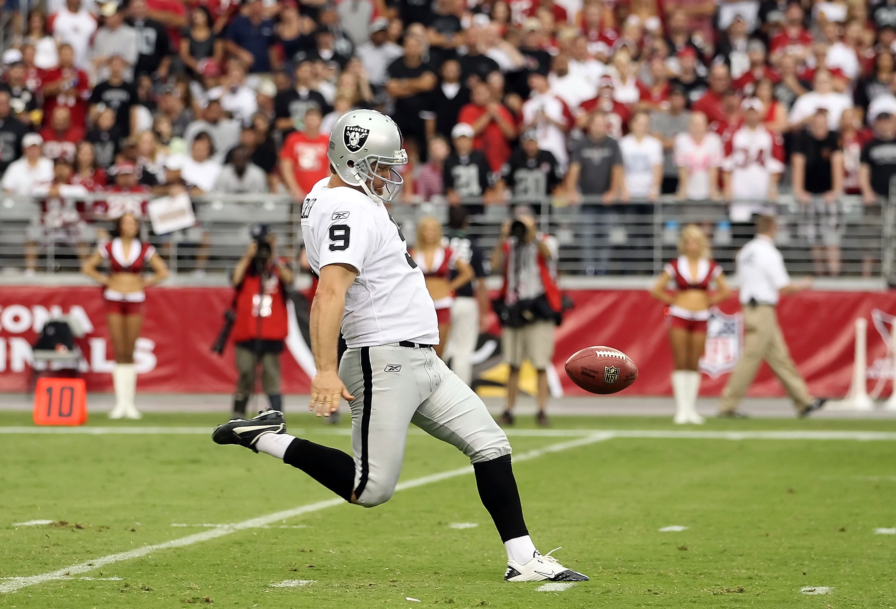 GLENDALE, AZ - SEPTEMBER 26:  Punter Shane Lechler #9 of the Oakland Raiders kicks the ball during the NFL game against the Arizona Cardinals at the University of Phoenix Stadium on September 26, 2010 in Glendale, Arizona.  The Cardinals defeated the Raid