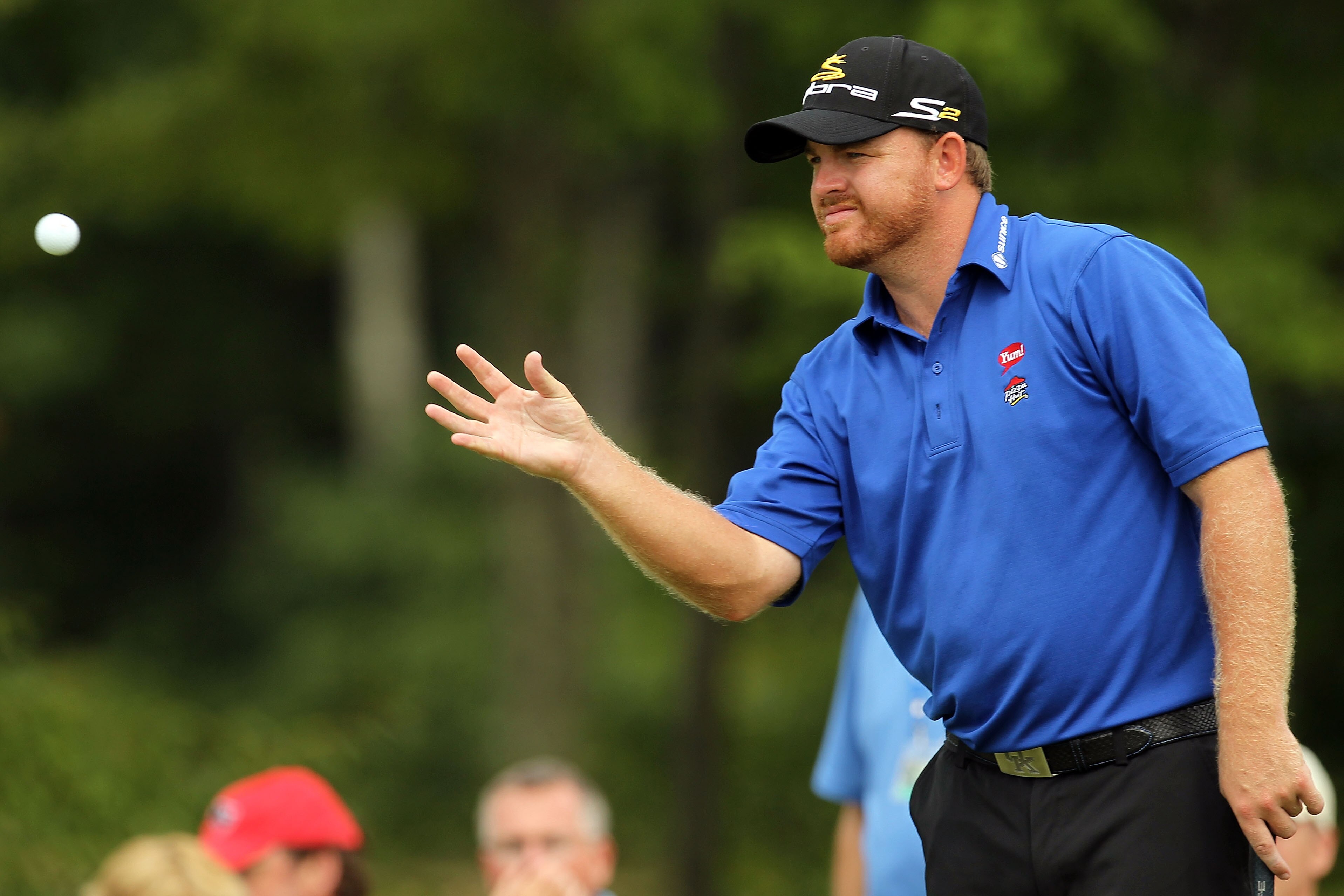 NORTON, MA - SEPTEMBER 03:  J.B. Holmes reacts after making a putt on the 13th hole during the first round of the Deutsche Bank Championship at TPC Boston on September 3, 2010 in Norton, Massachusetts.  (Photo by Mike Ehrmann/Getty Images)