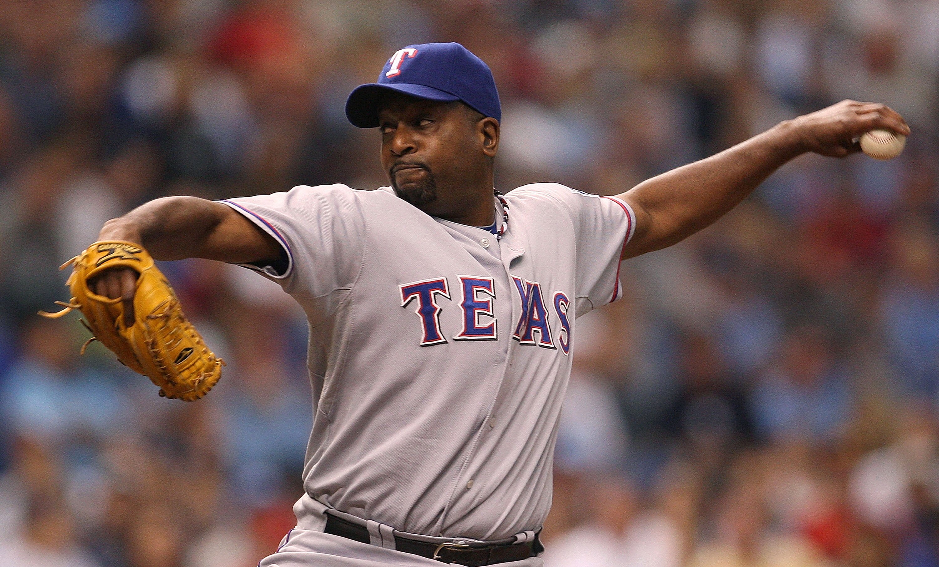 ST PETERSBURG, FL - OCTOBER 07:  Darren Oliver #28 of the Texas Rangers pitches during Game 2 of the ALDS against the Tampa Bay Rays at Tropicana Field on October 7, 2010 in St. Petersburg, Florida.  (Photo by Mike Ehrmann/Getty Images)