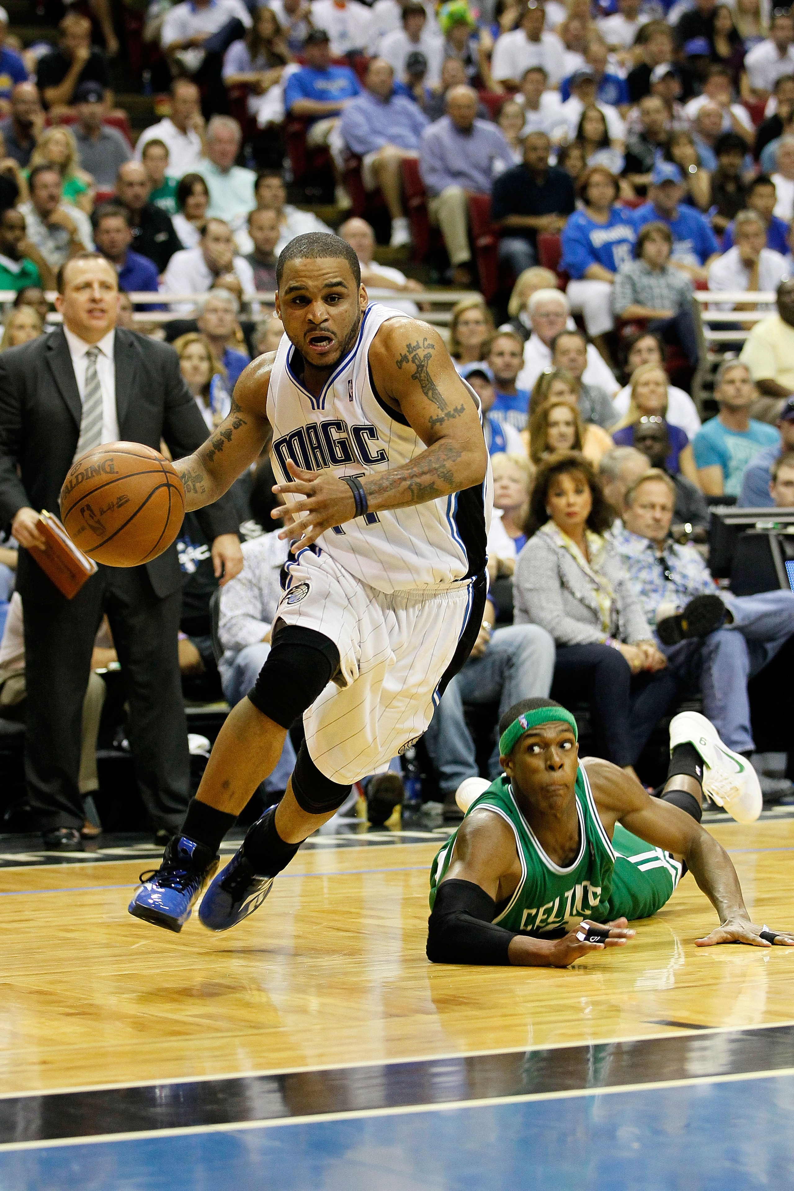 ORLANDO, FL - MAY 16:  Jameer Nelson #14 of the Orlando Magic drives past Rajon Rondo #9 of the Boston Celtics in Game One of the Eastern Conference Finals during the 2010 NBA Playoffs at Amway Arena on May 16, 2010 in Orlando, Florida.  NOTE TO USER: Use