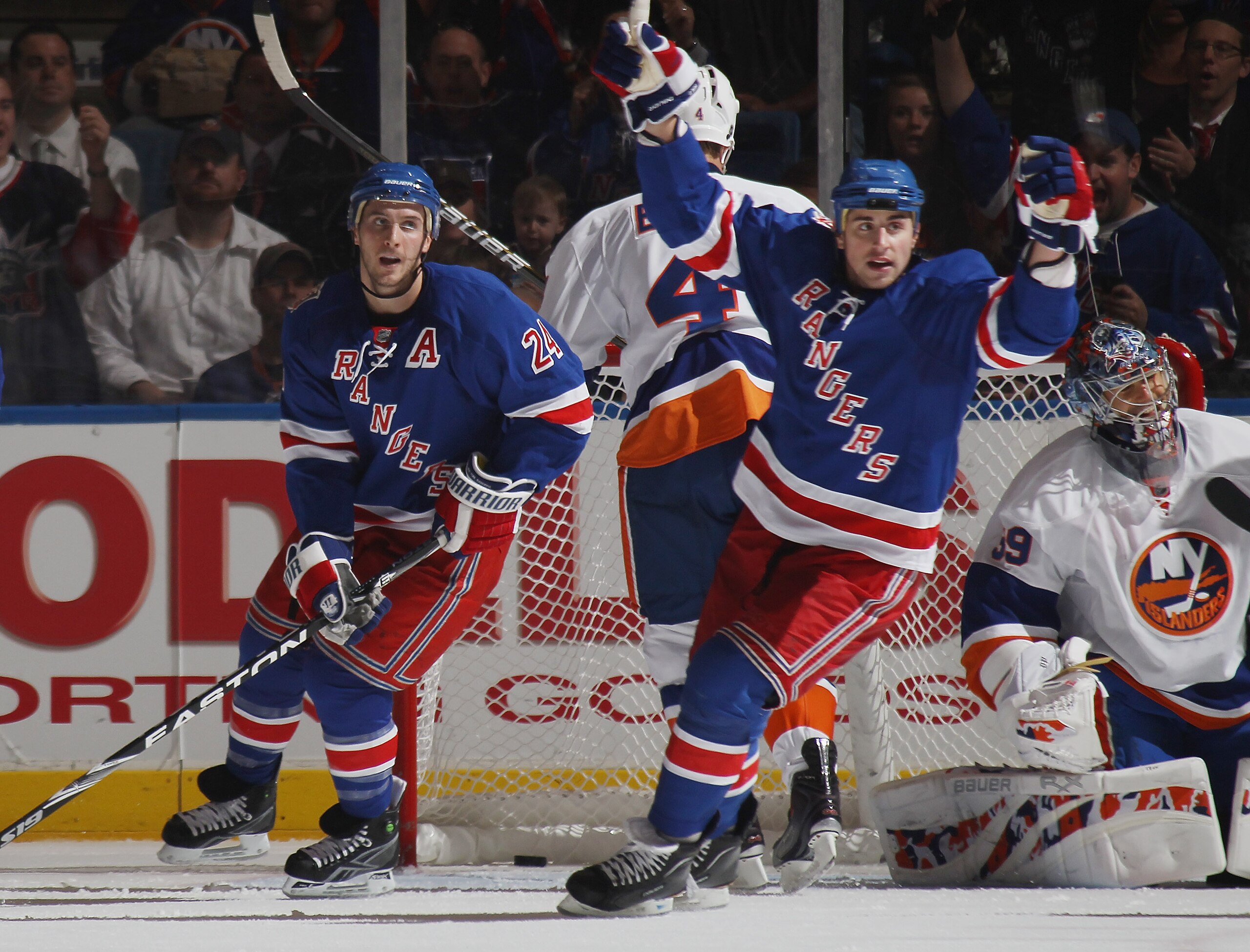 UNIONDALE, NY - OCTOBER 11: (L-R) Brandon Dubinsky #24 and Ryan Callahan #17 of the New York Rangers celebrate a power play goal by Michael Del Zotto (not shown) at 8:28 of the second period against the New York Islanders at the Nassau Coliseum on October UNIONDALE, NY - OCTOBER 11: (L-R) Brandon Dubinsky #24 and Ryan Callahan #17 of the New York Rangers celebrate a power play goal by Michael Del Zotto (not shown) at 8:28 of the second period against the New York Islanders at the Nassau Coliseum on October