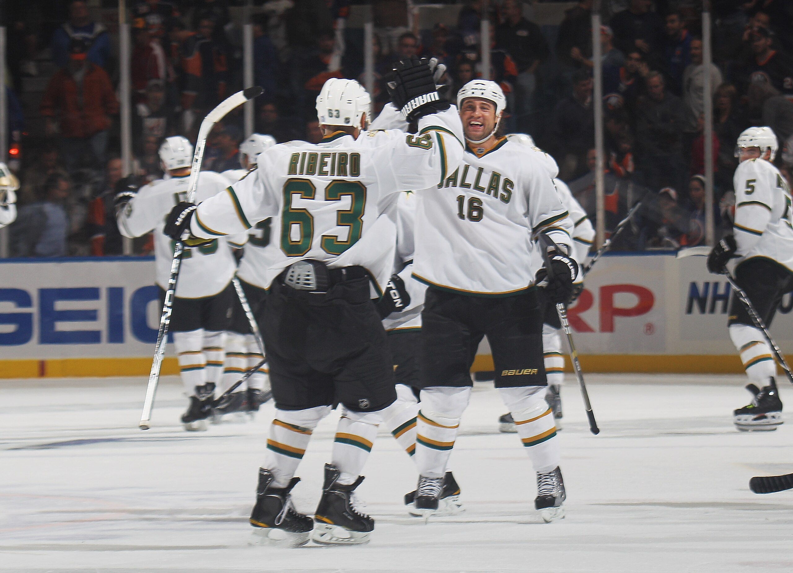 UNIONDALE, NY - OCTOBER 09: Mike Ribeiro #63 of the Dallas Stars scores in the shootout and is greeted by Adam Burish #16 in their game against the New York Islanders at the Nassau Coliseum on October 9, 2010 in Uniondale, New York. The Stars defeated the UNIONDALE, NY - OCTOBER 09: Mike Ribeiro #63 of the Dallas Stars scores in the shootout and is greeted by Adam Burish #16 in their game against the New York Islanders at the Nassau Coliseum on October 9, 2010 in Uniondale, New York. The Stars defeated the