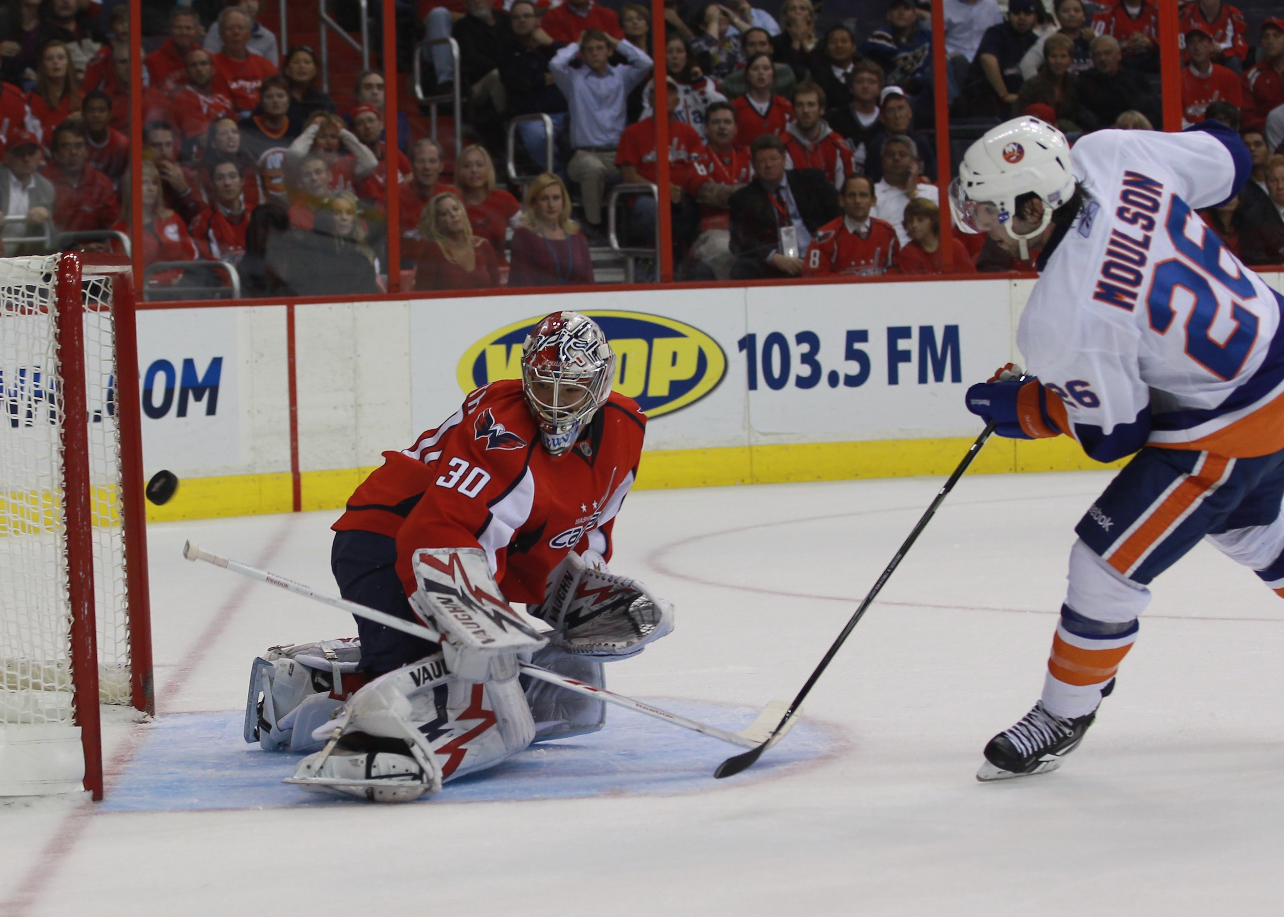 WASHINGTON - OCTOBER 13: Matt Moulson #26 of the New York Islanders is stopped on a third period breakaway by Michal Neuvirth #30 of the Washington Capitals at the Verizon Center on October 13, 2010 in Washington, DC. The Capitals defeated the Islanders WASHINGTON - OCTOBER 13: Matt Moulson #26 of the New York Islanders is stopped on a third period breakaway by Michal Neuvirth #30 of the Washington Capitals at the Verizon Center on October 13, 2010 in Washington, DC. The Capitals defeated the Islanders