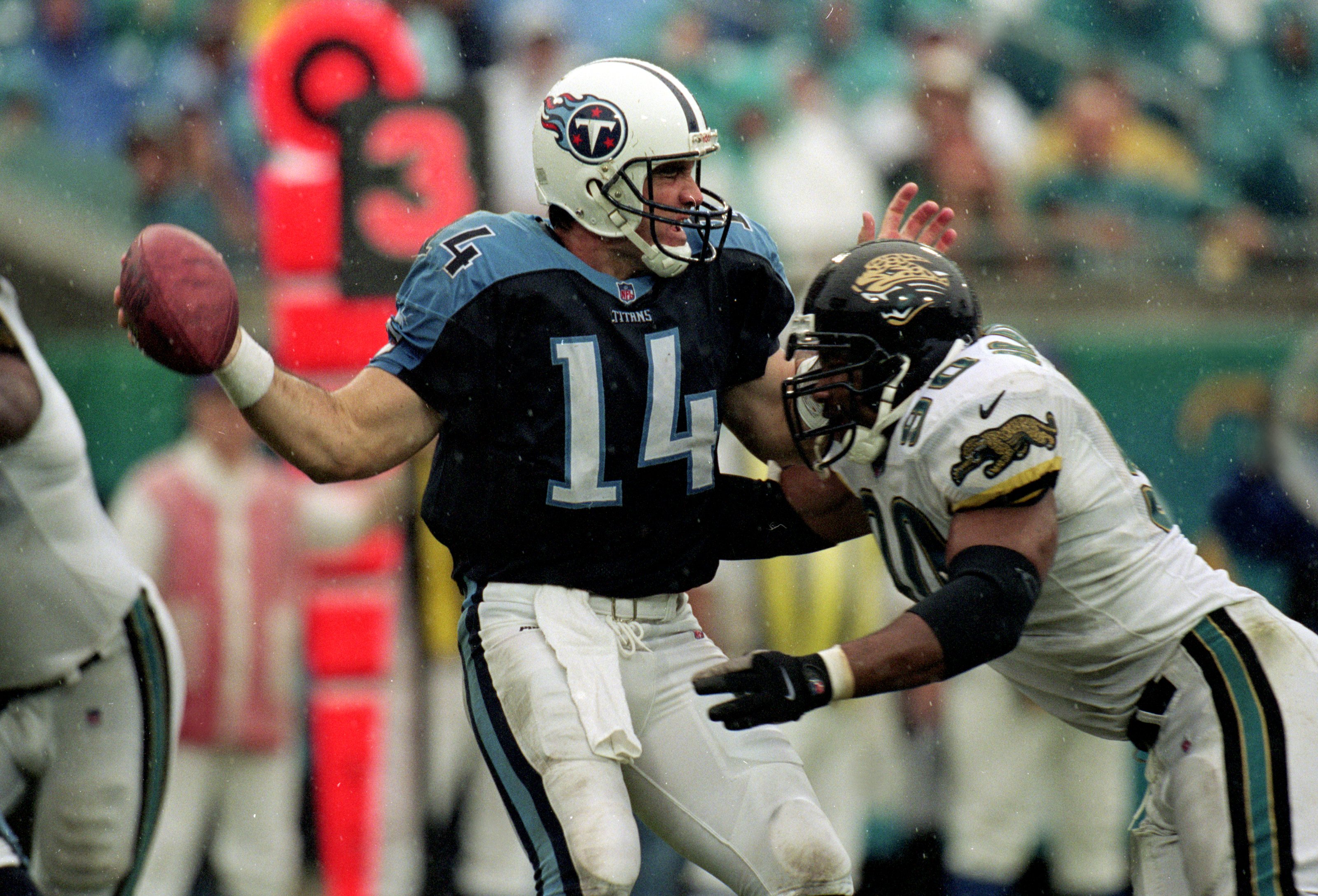 26 Sep 1999:  Neil O''Donnell #14 of the Tennessee Titans is sacked during a game against the Jacksonville Jaguars at the Alltel Stadium in Jacksonville, Florida. The Titans defeated the Jaguars 20-19. Mandatory Credit: Tom Hauck  /Allsport