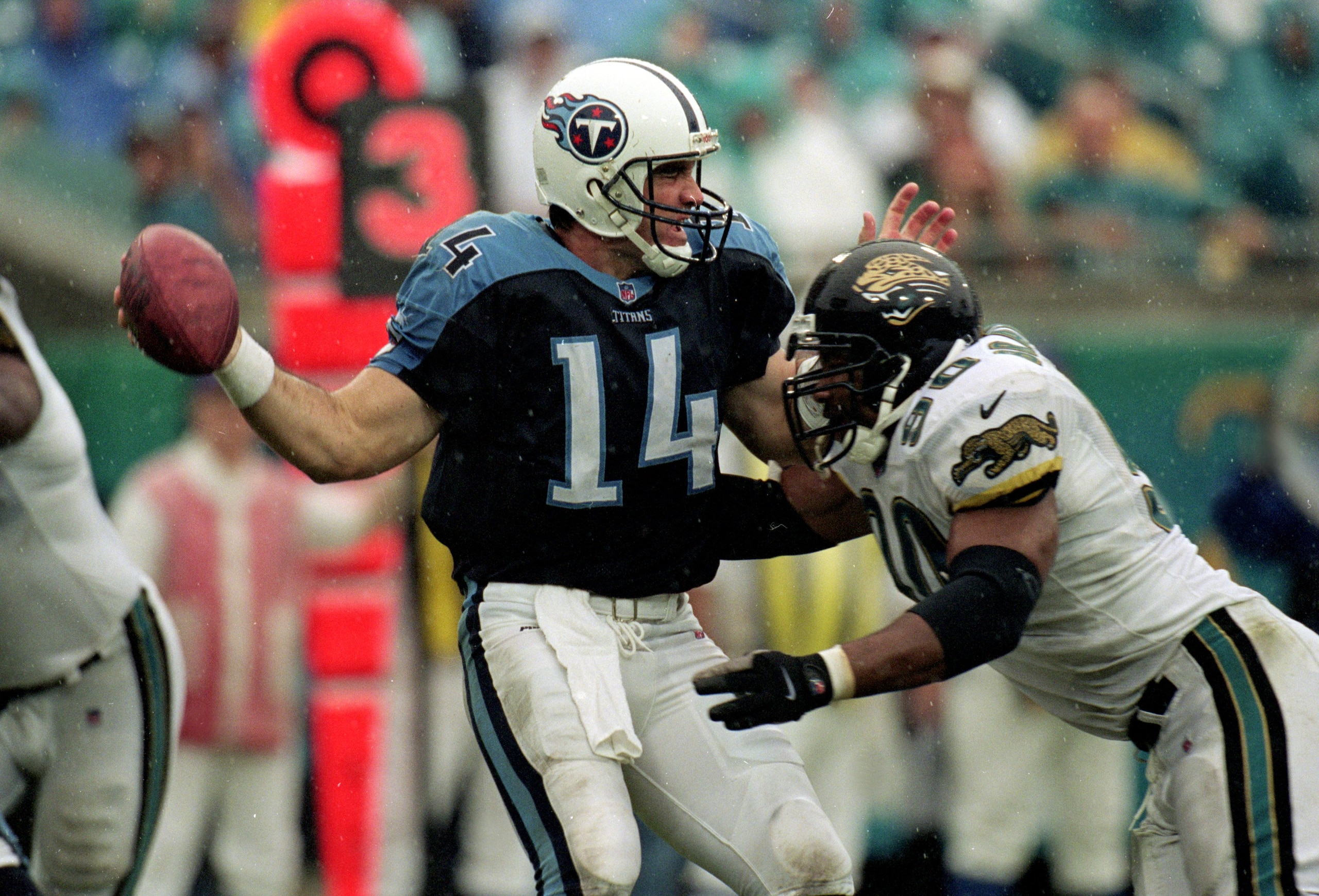 26 Sep 1999:  Neil O''Donnell #14 of the Tennessee Titans is sacked during a game against the Jacksonville Jaguars at the Alltel Stadium in Jacksonville, Florida. The Titans defeated the Jaguars 20-19. Mandatory Credit: Tom Hauck  /Allsport