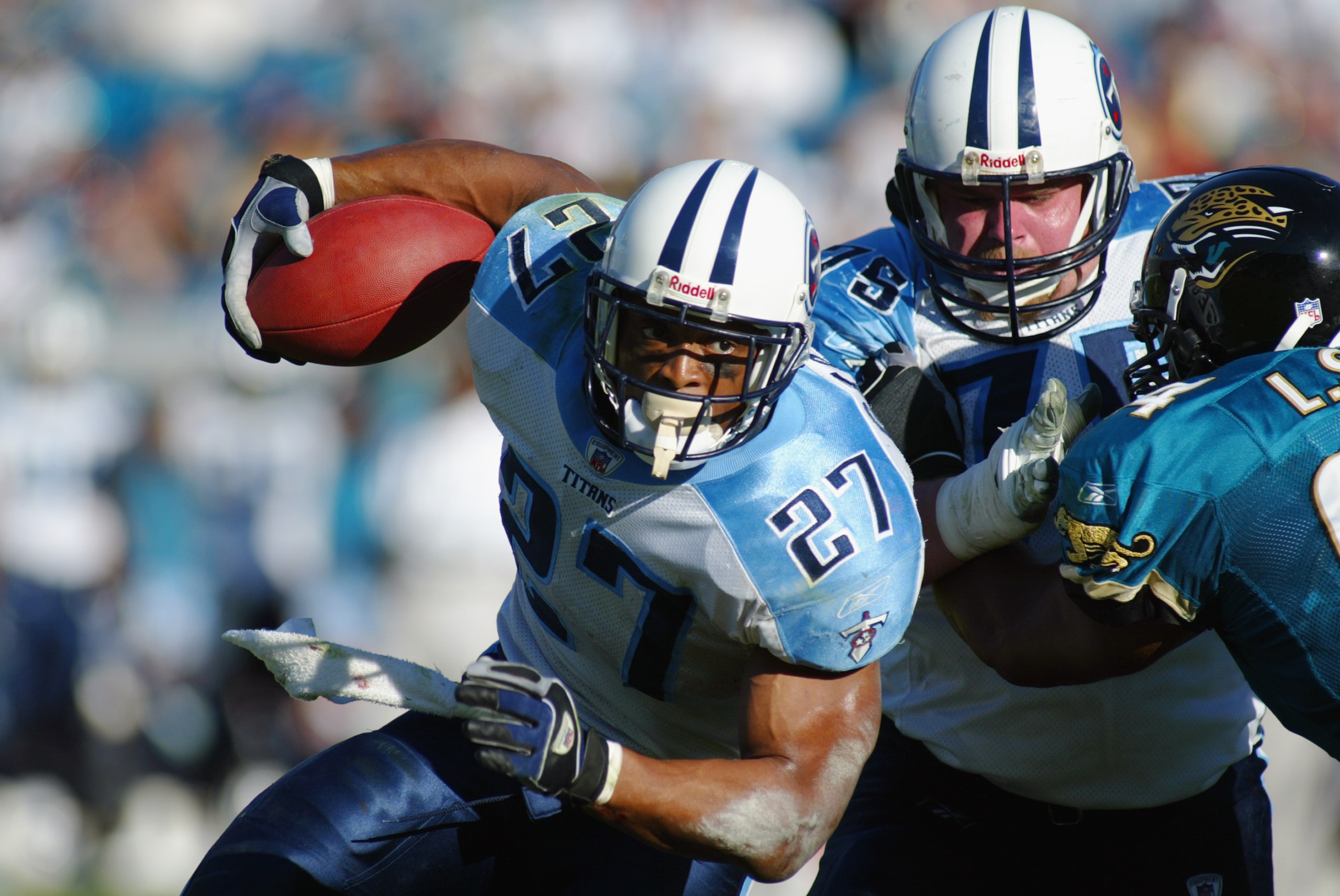 JACKSONVILLE, FL - DECEMBER 22:  Running back Eddie George #27 of the Tennessee Titans runs against the Jacksonville Jaguars during the game at Alltel Stadium on December 22, 2002 in Jacksonville, Florida. The Titans defeated the Jaguars 26-10. (Photo By