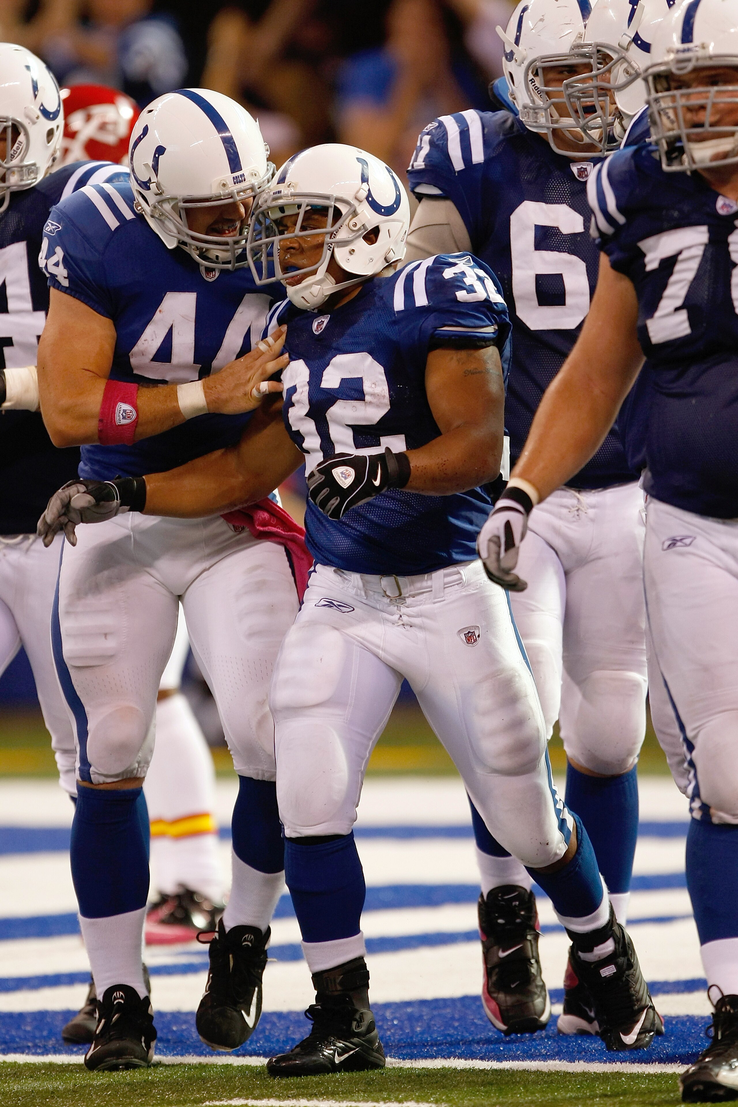 INDIANAPOLIS, IN - OCTOBER 10: Mike Hart #32 of the Indianapolis Colts is congratulated by Dallas Clark after scoring a touchdown against the Kansas City Chiefs at Lucas Oil Stadium on October 10, 2010 in Indianapolis, Indiana. The Colts defeated the Chie