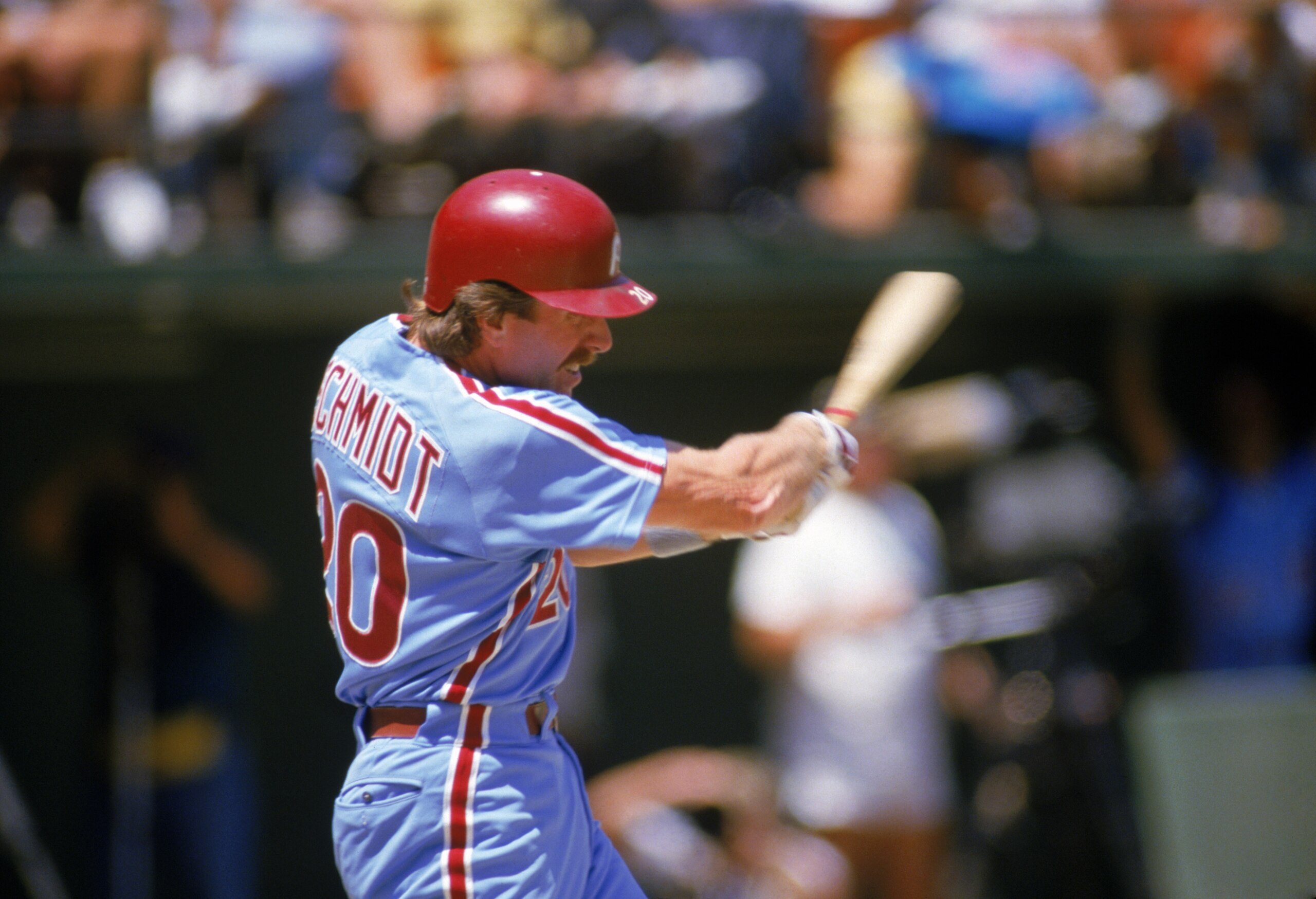 SAN DIEGO - 1987:  Mike Schmidt #20 of the Philadelphia Phillies swings at a pitch during a 1987 season game against the Padres at Jack Murphy Stadium in San Diego, California. (Photo by Stephen Dunn/Getty Images)