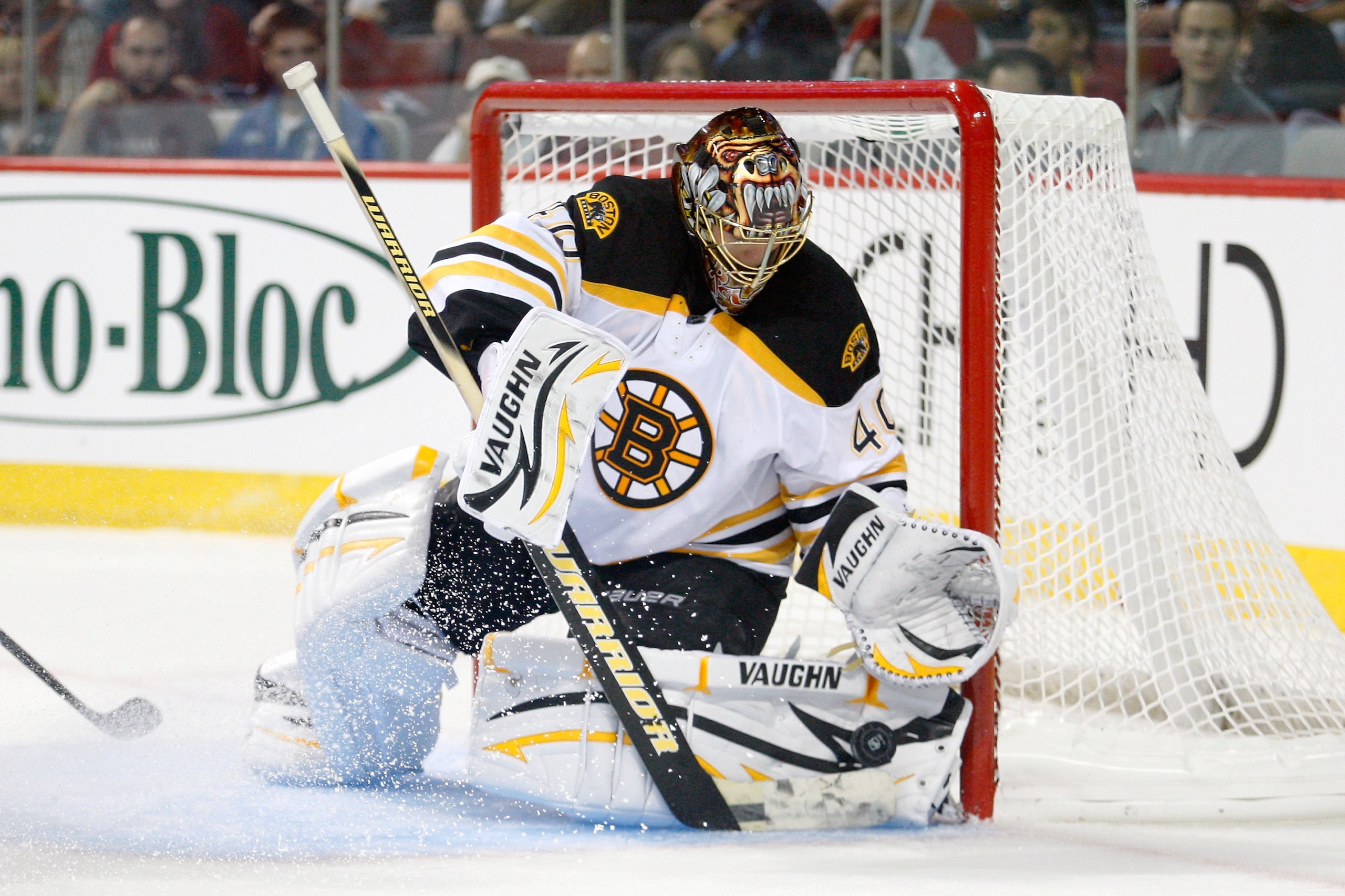 MONTREAL- SEPTEMBER 22:  Tuukka Rask #40 of the Boston Bruins stops the puck during an NHL pre-season game against the Montreal Canadiens at the Bell Centre on September 22, 2010 in Montreal, Quebec, Canada.  The Bruins defeated the Canadiens 4-2.  (Photo