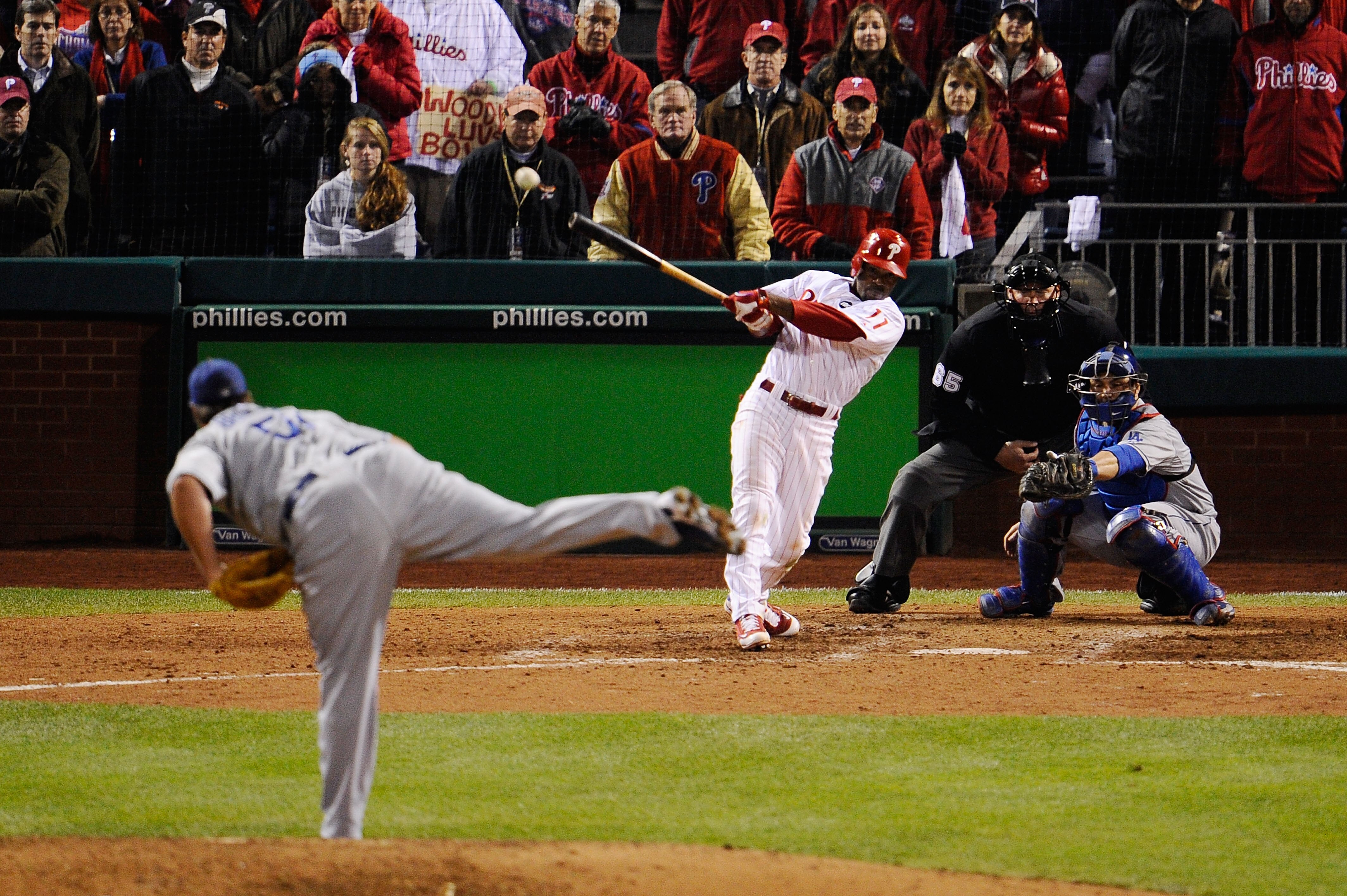 PHILADELPHIA - OCTOBER 19:  Jimmy Rollins #11 of the Philadelphia Phillies hits a game-winning walkoff 2-run double in the bottom of the ninth inning to win 5-4 against Jonathan Broxton #51 of the Los Angeles Dodgers in Game Four of the NLCS during the 20