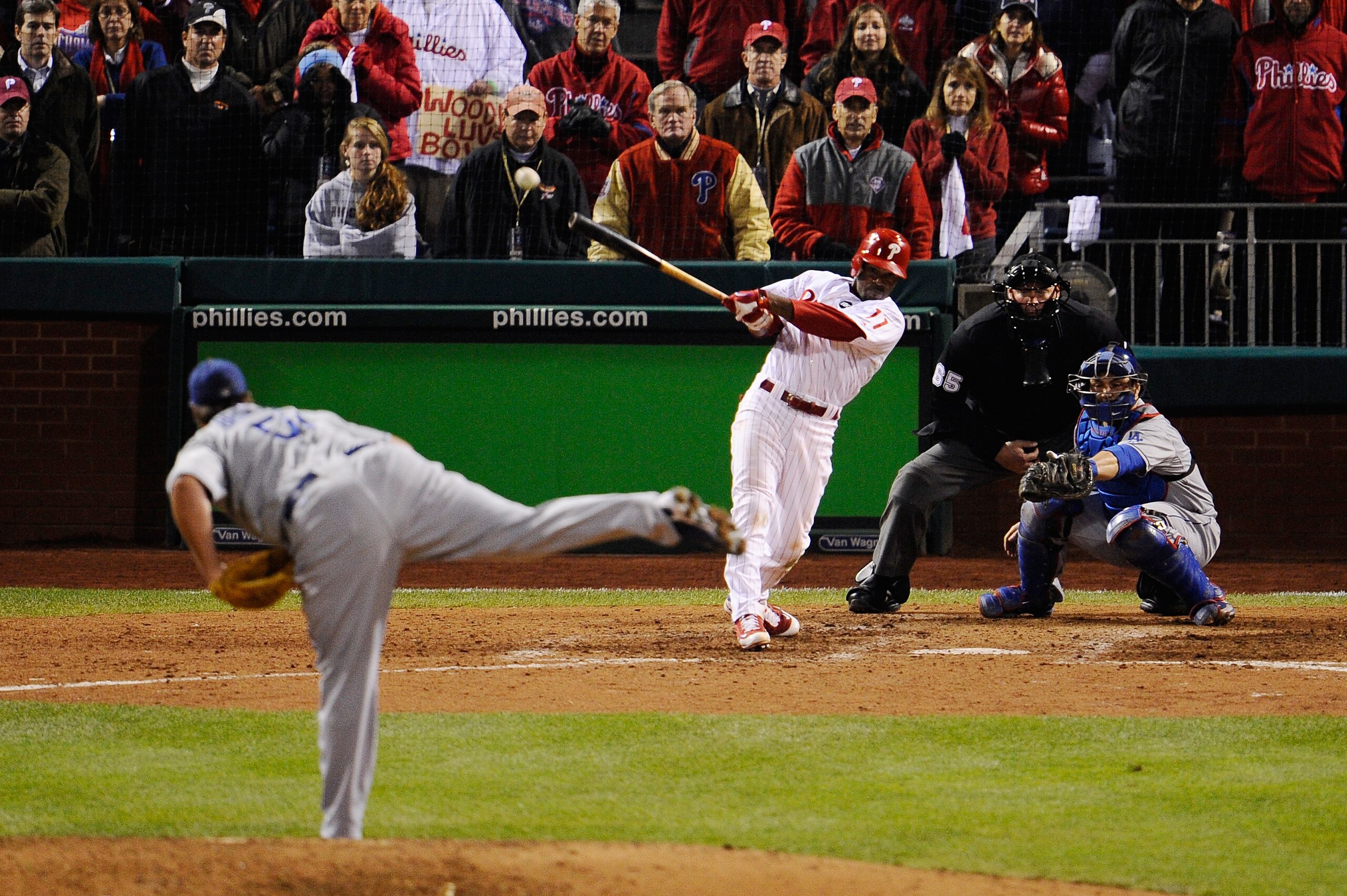 PHILADELPHIA - OCTOBER 19:  Jimmy Rollins #11 of the Philadelphia Phillies hits a game-winning walkoff 2-run double in the bottom of the ninth inning to win 5-4 against Jonathan Broxton #51 of the Los Angeles Dodgers in Game Four of the NLCS during the 20